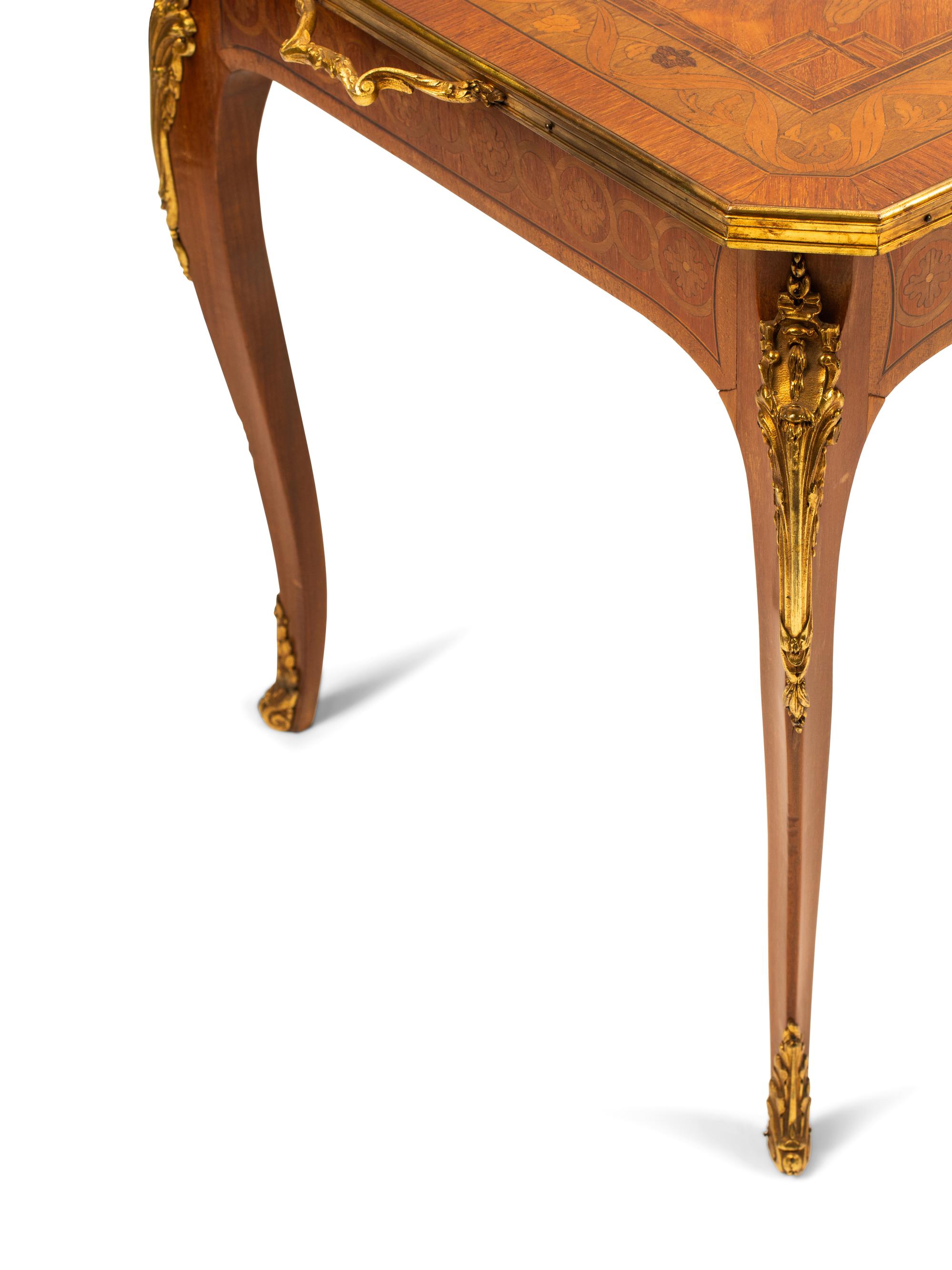 A Pair of Louis XV Style Gilt Bronze and Porcelain Mounted Marquetry Tables