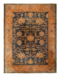 An Oushak Wool Rug
