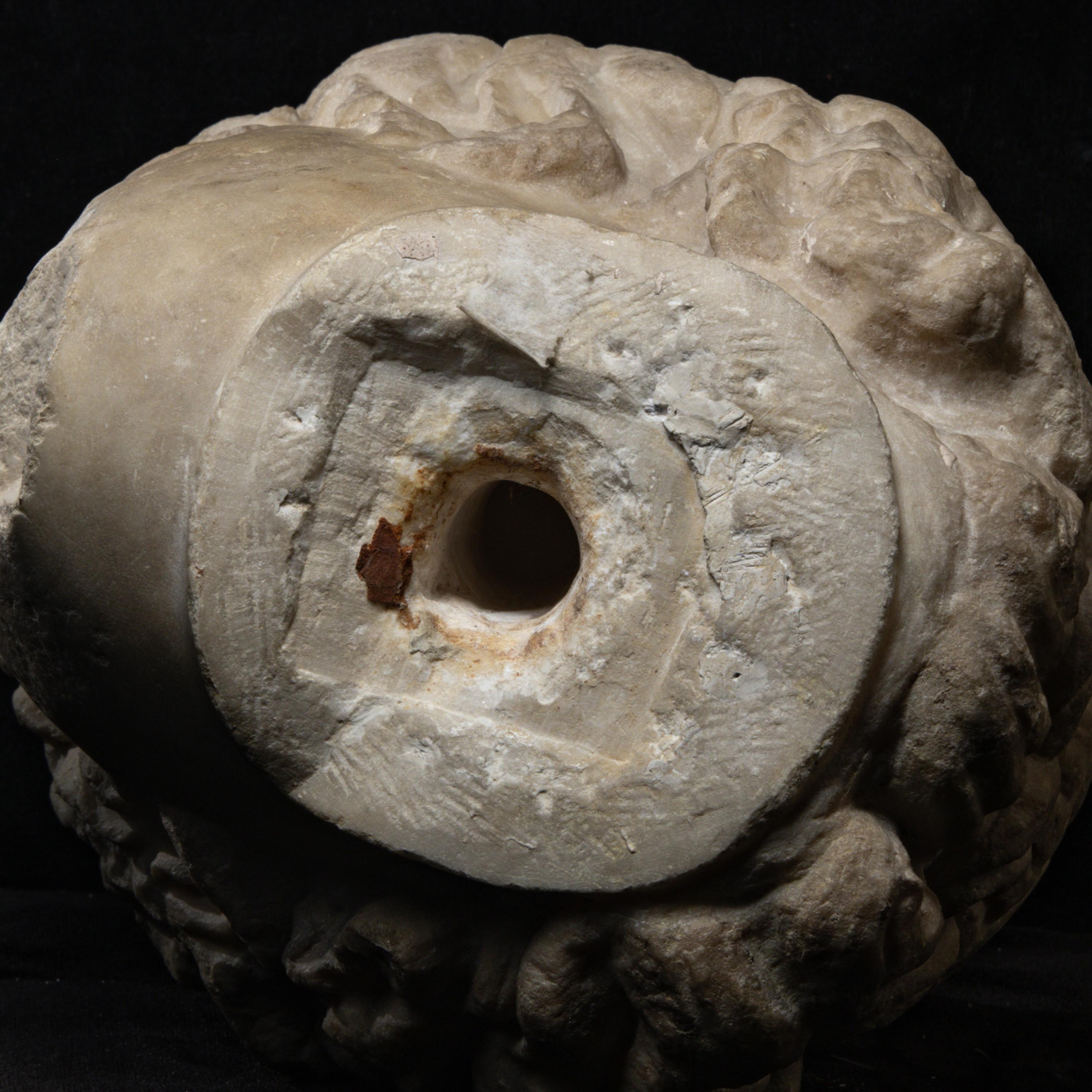 A Roman Marble Head of a Satyr