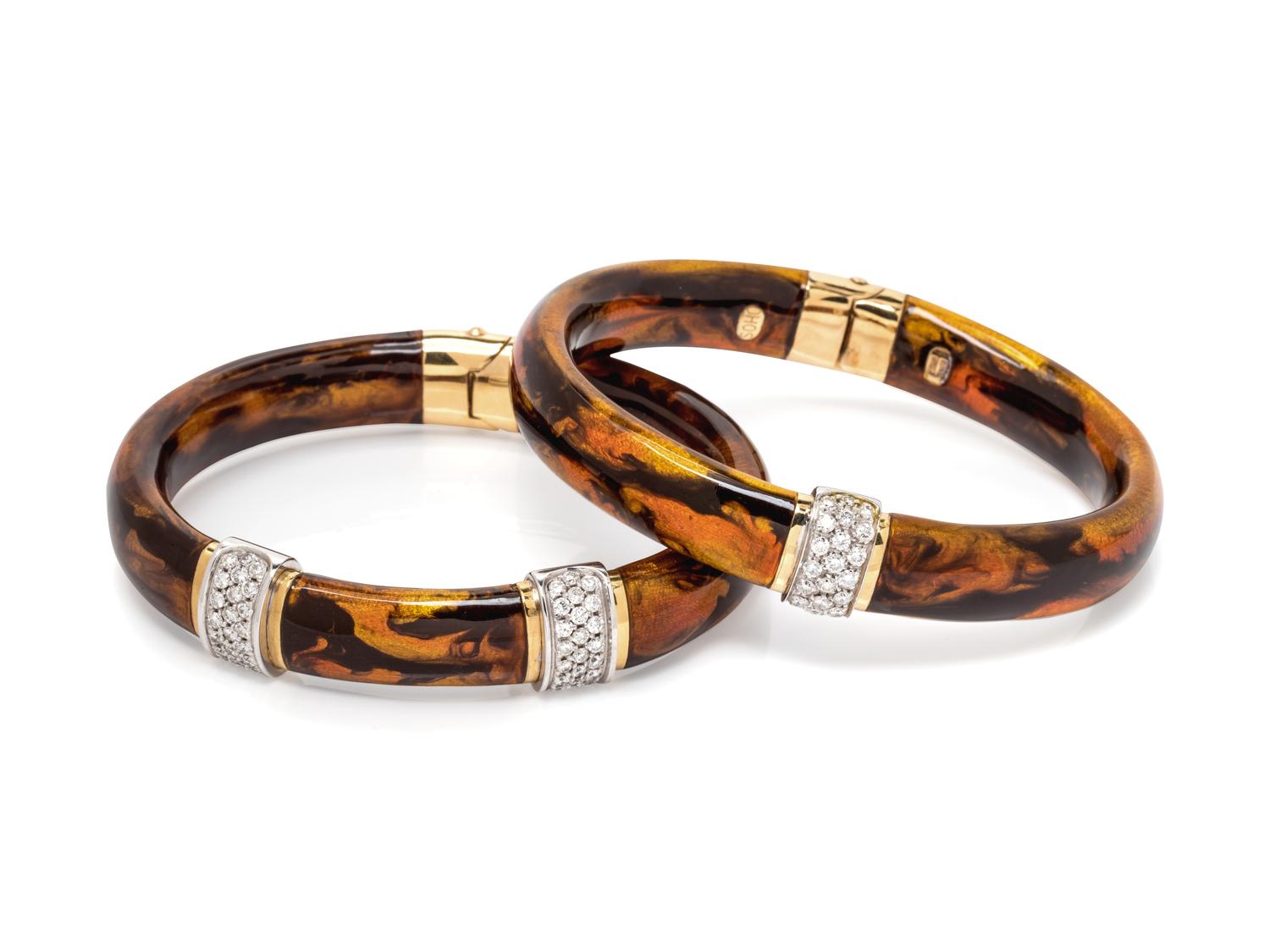 A Pair of 18 Karat Bicolor Gold, Diamond and Enamel Bangles, Soho,