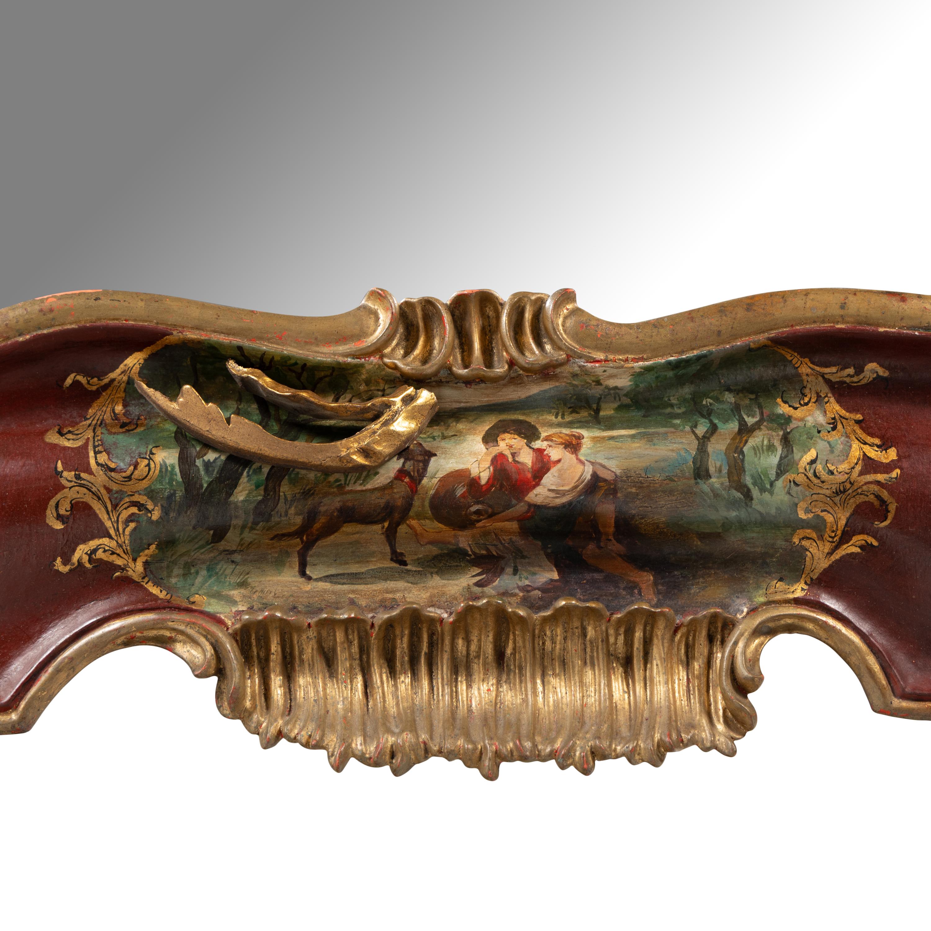 A Venetian Rococo Style Polychrome Painted and Parcel Gilt Mirror