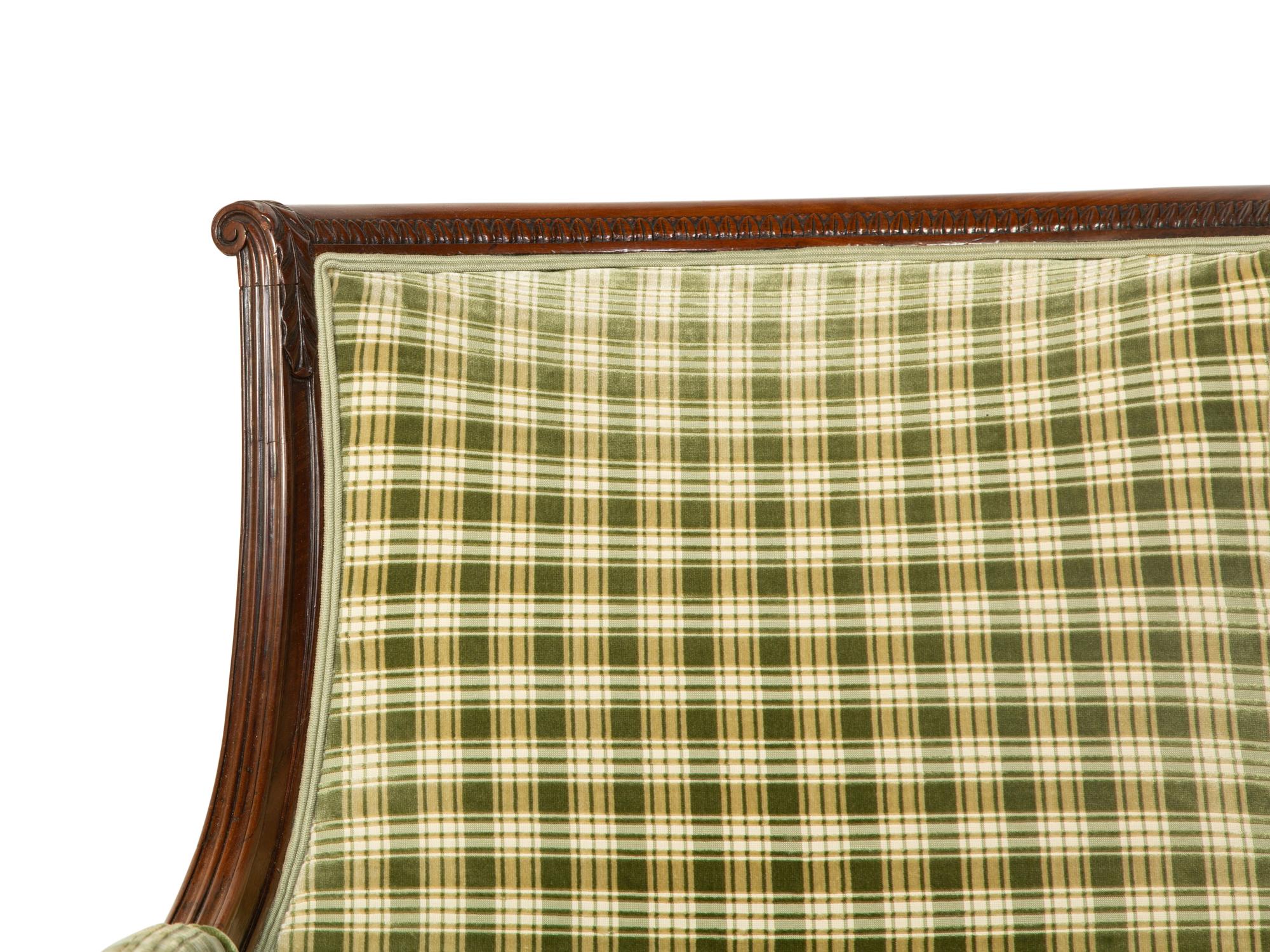 A Regency Style Carved Mahogany High Back Upholstered Armchair — 19TH CENTURY