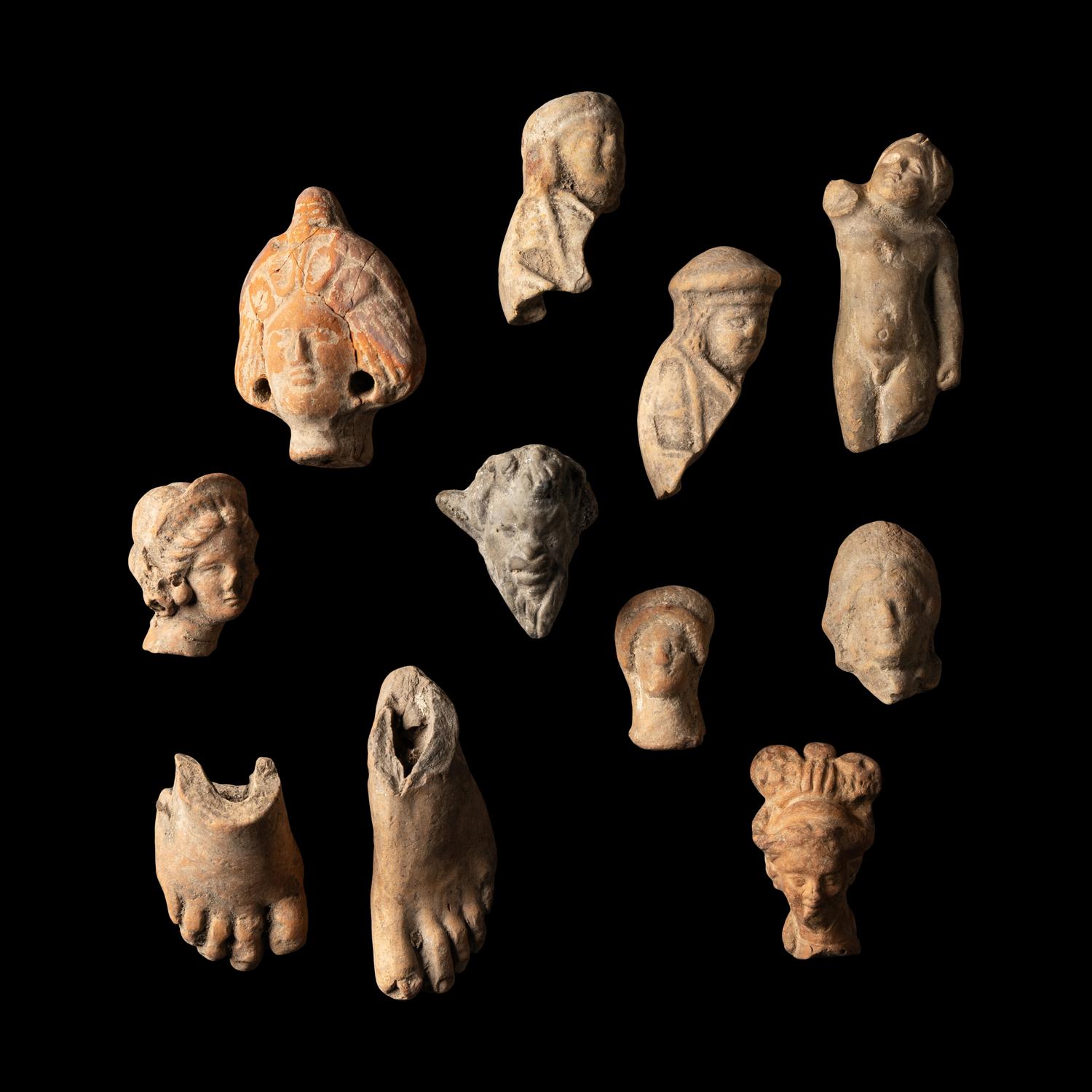 Eleven Hellenistic and Roman Terracotta Figure and Foot Fragments
