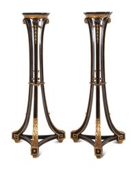A Pair of Regency Style Black Painted and Parcel Gilt Pedestals