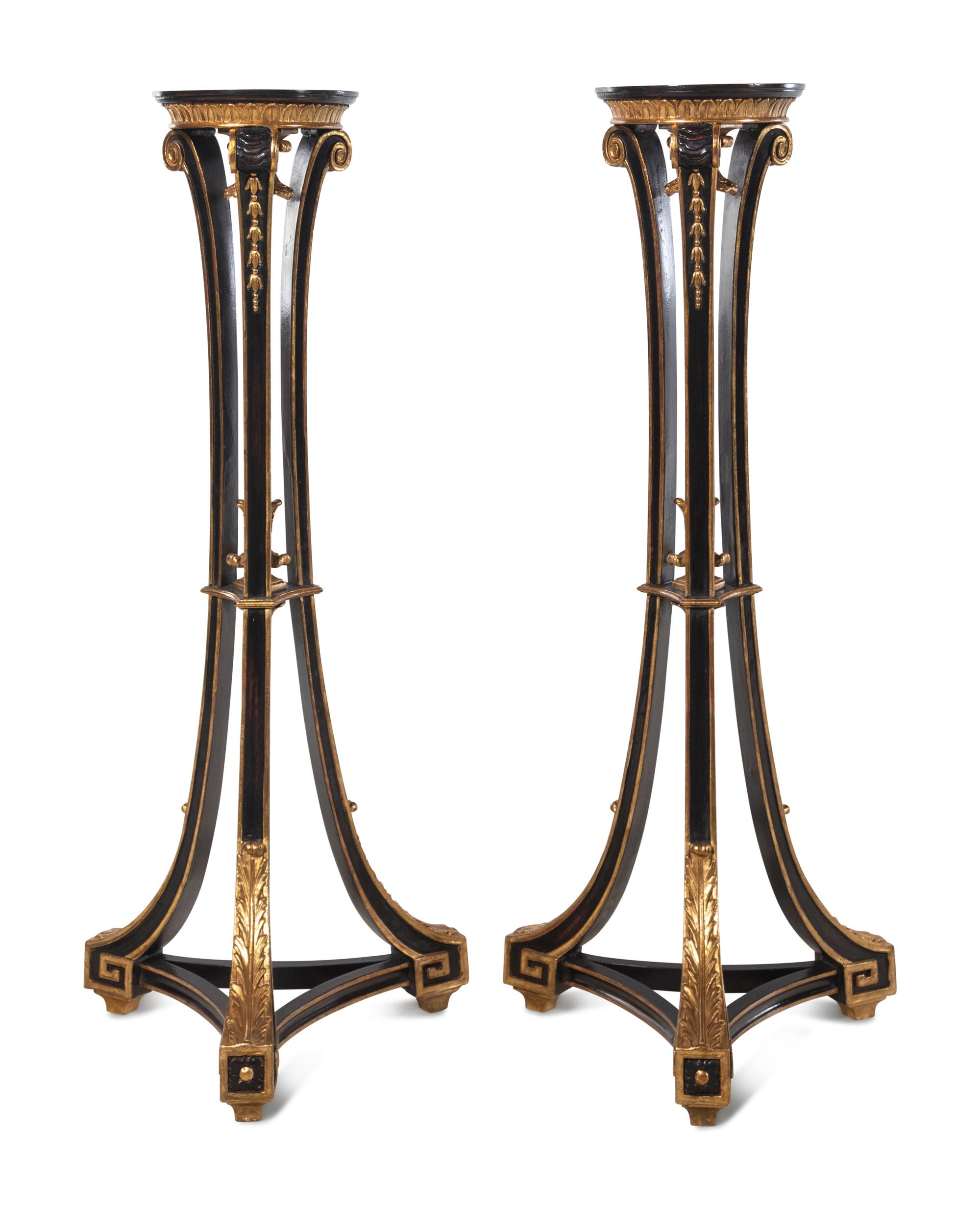 A Pair of Regency Style Black Painted and Parcel Gilt Pedestals
