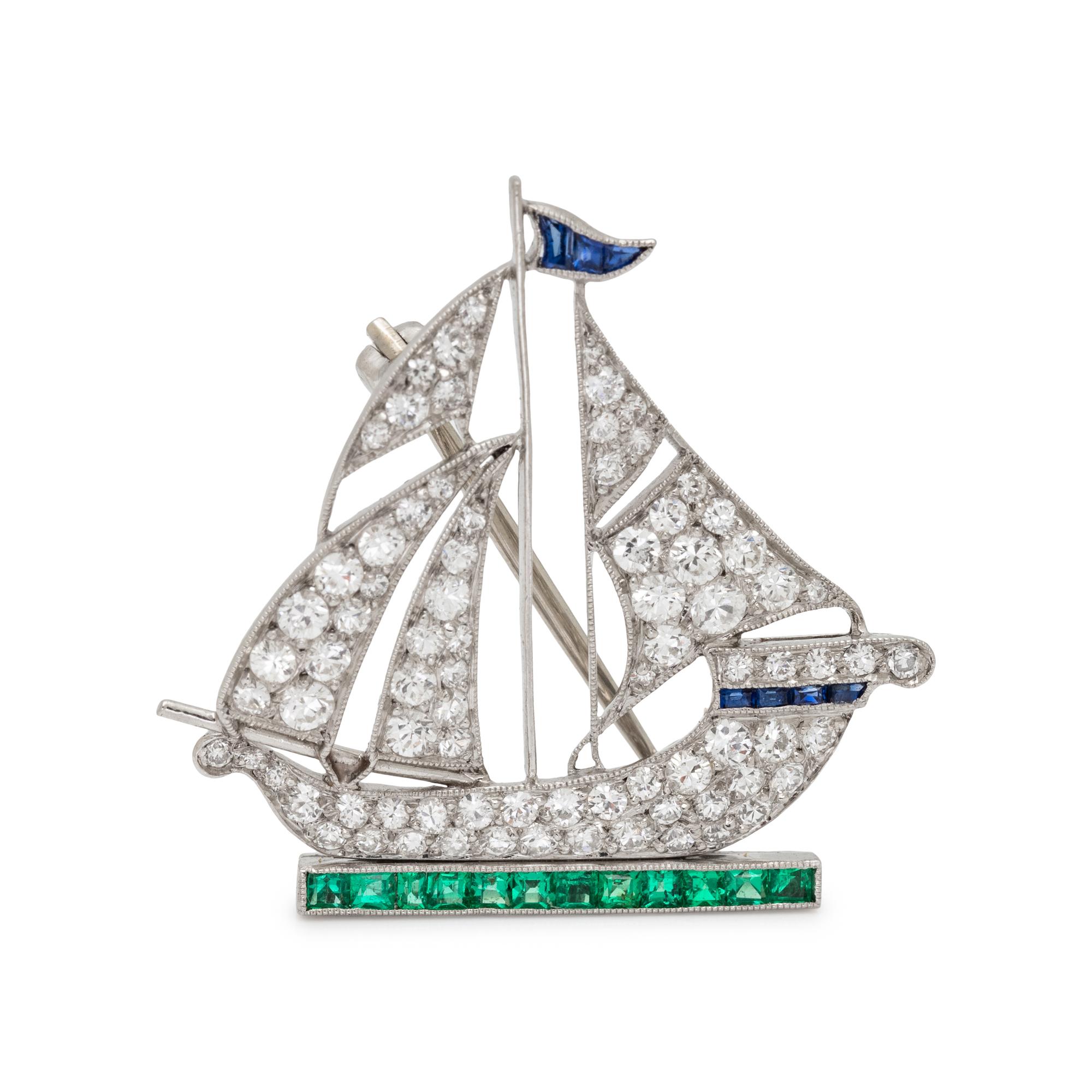 ART DECO, DIAMOND, EMERALD AND SAPPHIRE SAILBOAT BROOCH