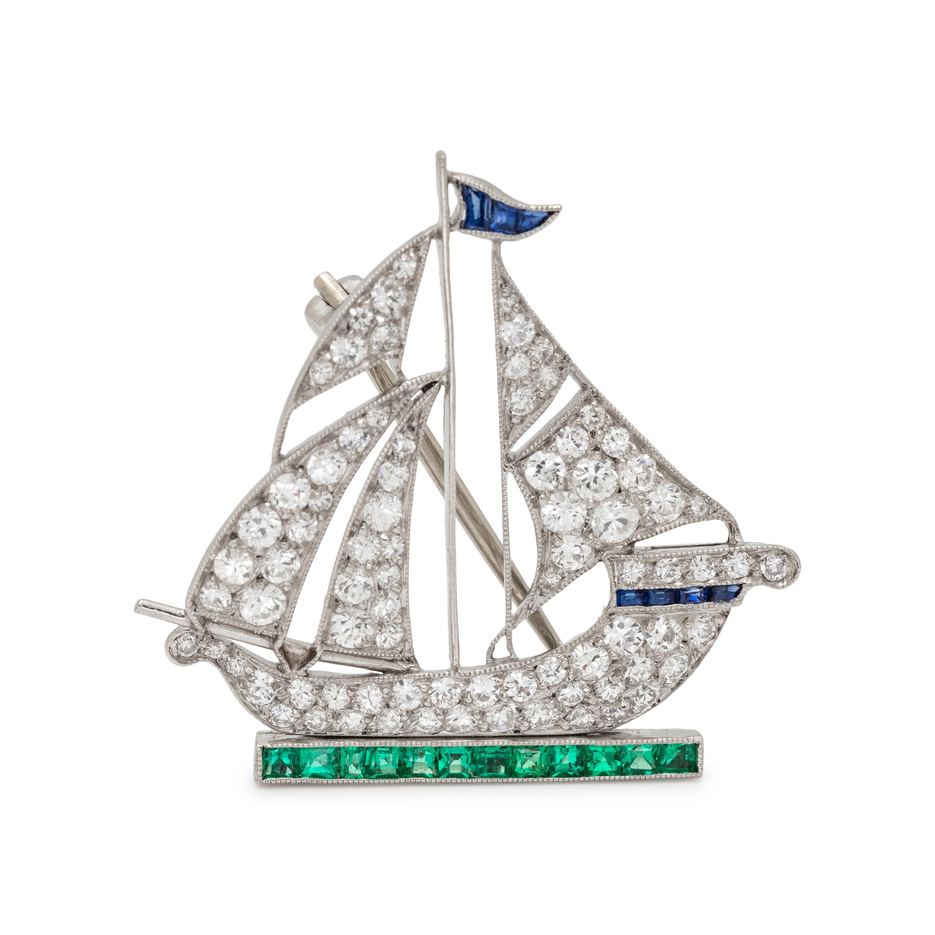 ART DECO, DIAMOND, EMERALD AND SAPPHIRE SAILBOAT BROOCH