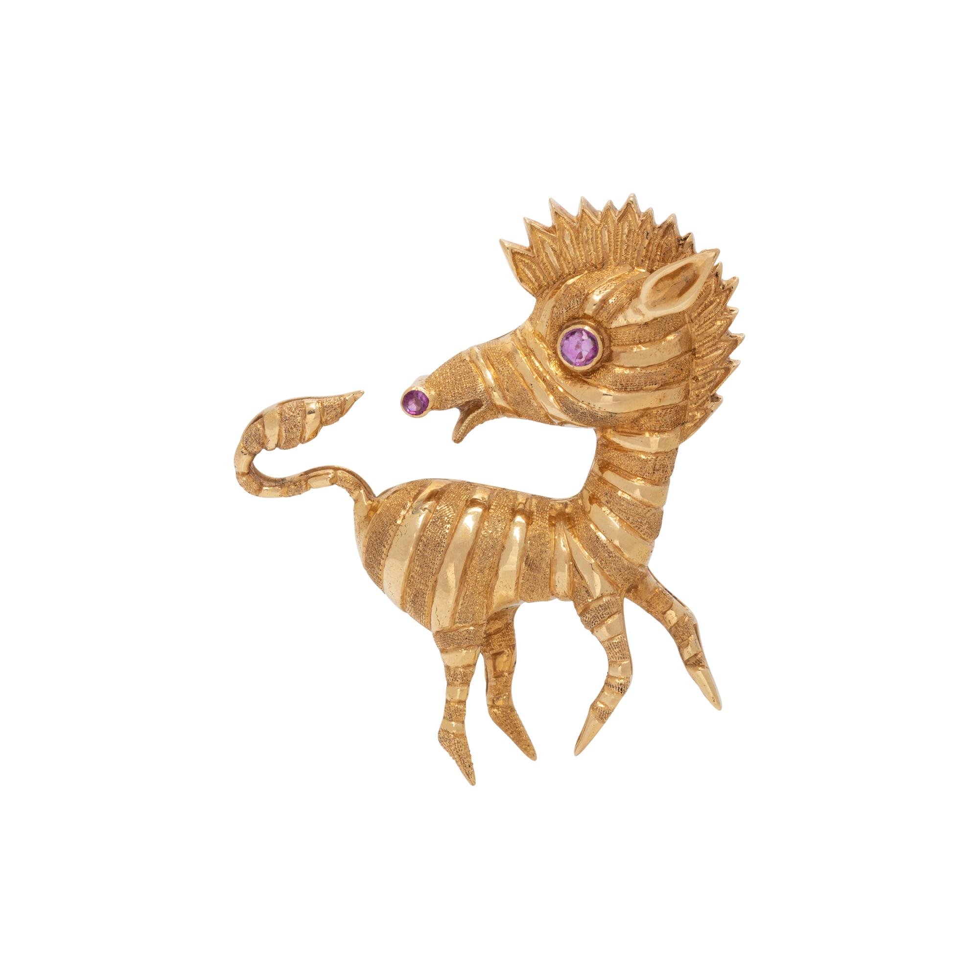 CARTIER, YELLOW GOLD AND RUBY ZEBRA BROOCH