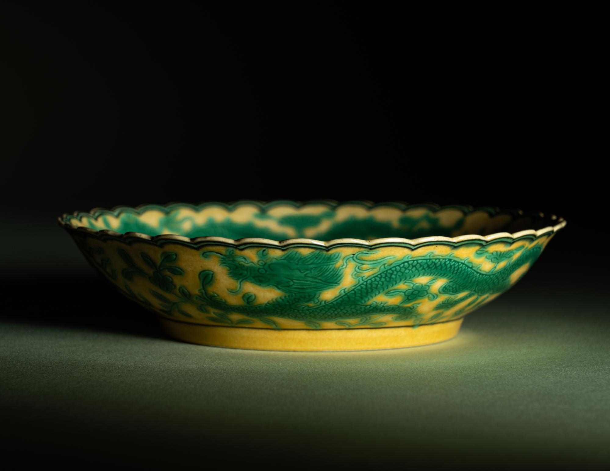 A Pair of Green Enameled Yellow Ground Glazed Incised 'Dragon' Dishes