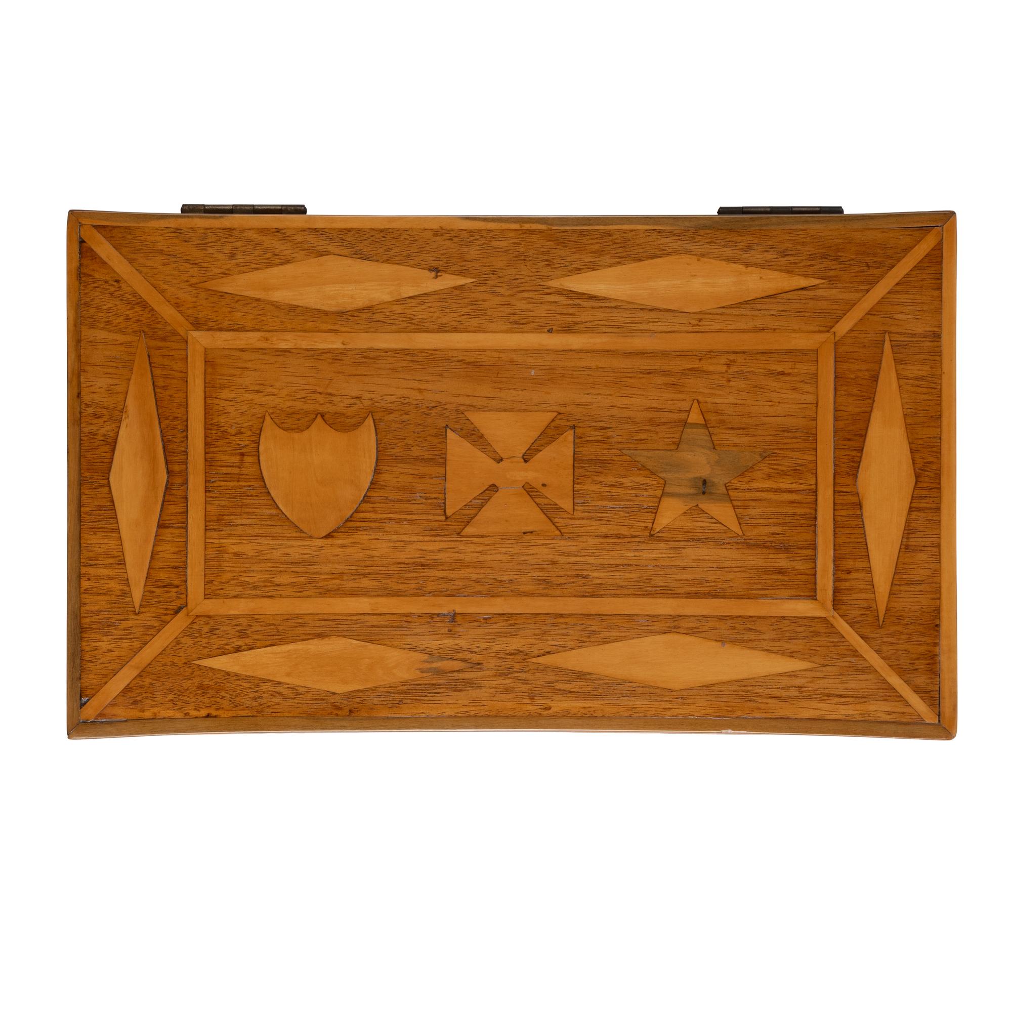 [LINCOLN CONSPIRATORS]. A marquetry box constructed by Lincoln conspirator Dr. Samuel Mudd while imprisoned at Fort Jefferson, ca 1867.