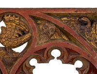 A Gothic Style Painted and Parcel Gilt Relief Panel