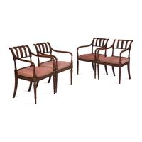A Set of Four Regency Style Paint-Decorated Fruitwood Open Armchairs