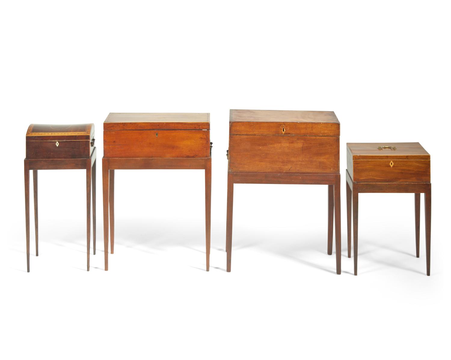 A group of four George III inlaid mahogany writing and document boxes on later stands, late 18th / early 19th century and later