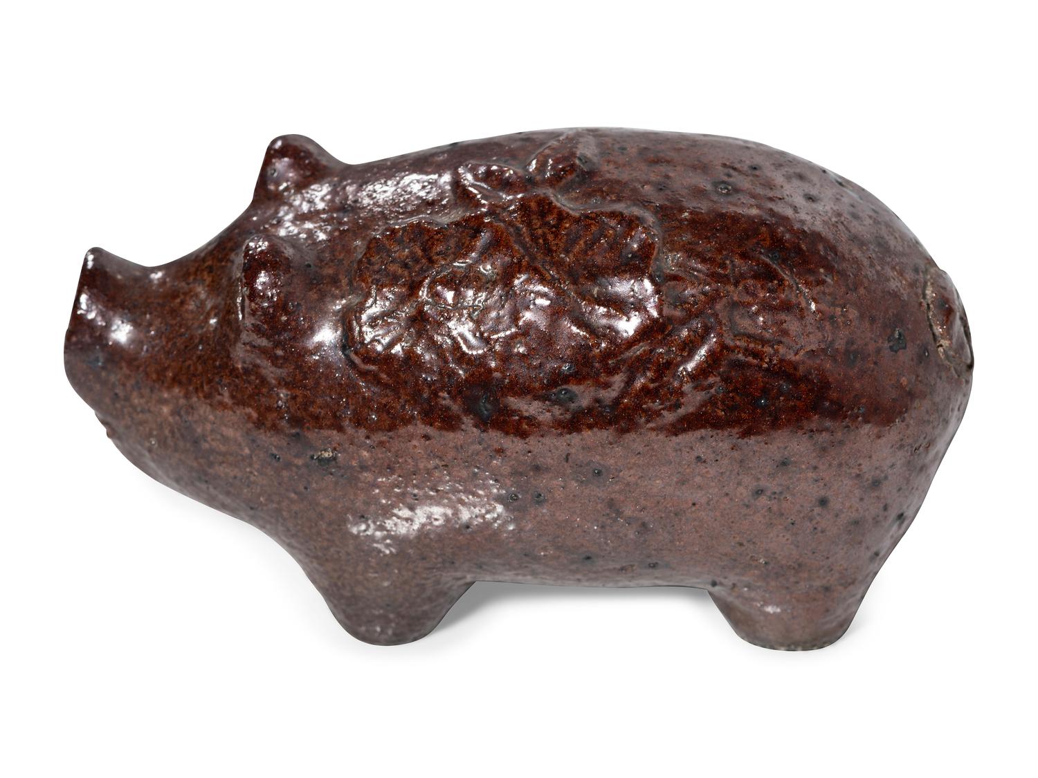 An Ohio Brown-Glazed Sewer Tile Pig