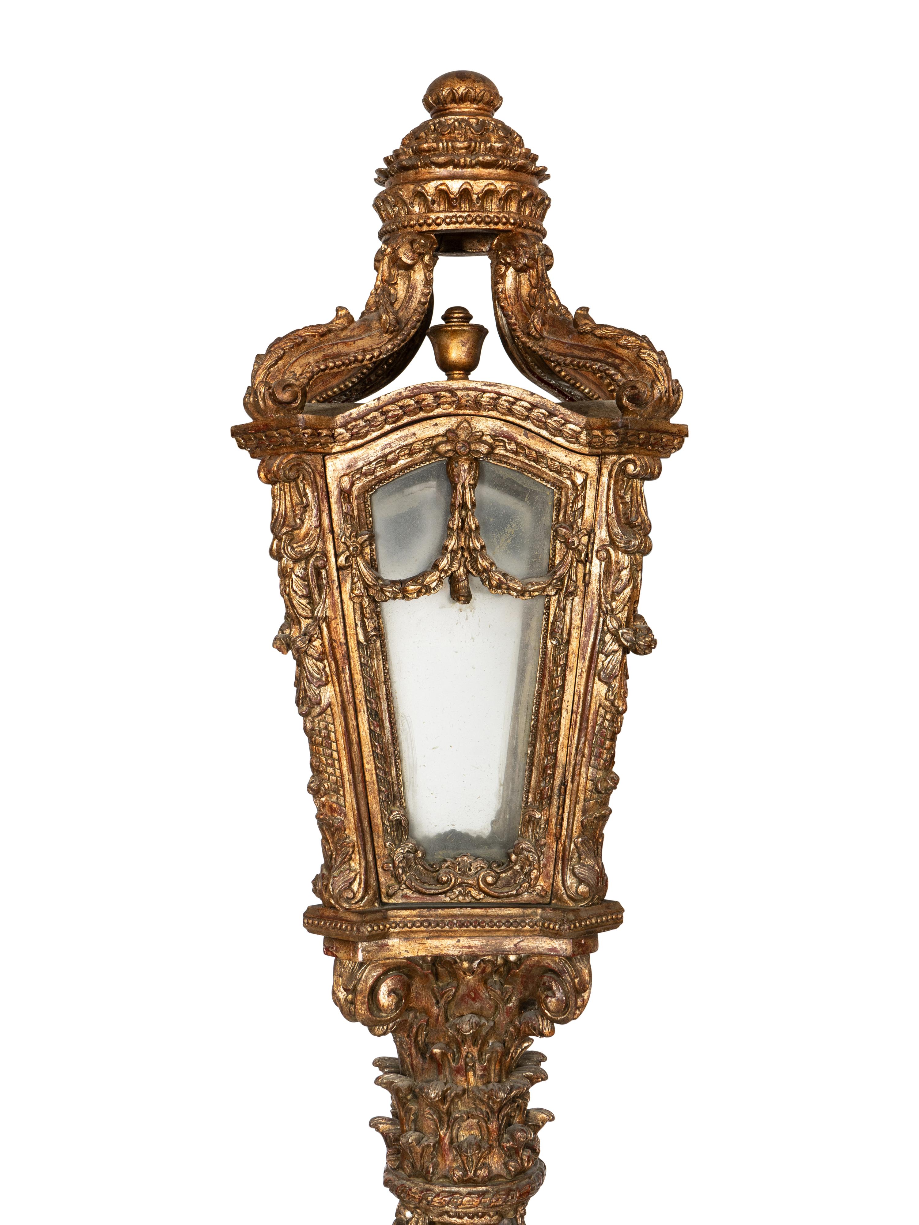 A Pair of Monumental Louis XV Style Elaborately Carved Giltwood Gondola Lanterns