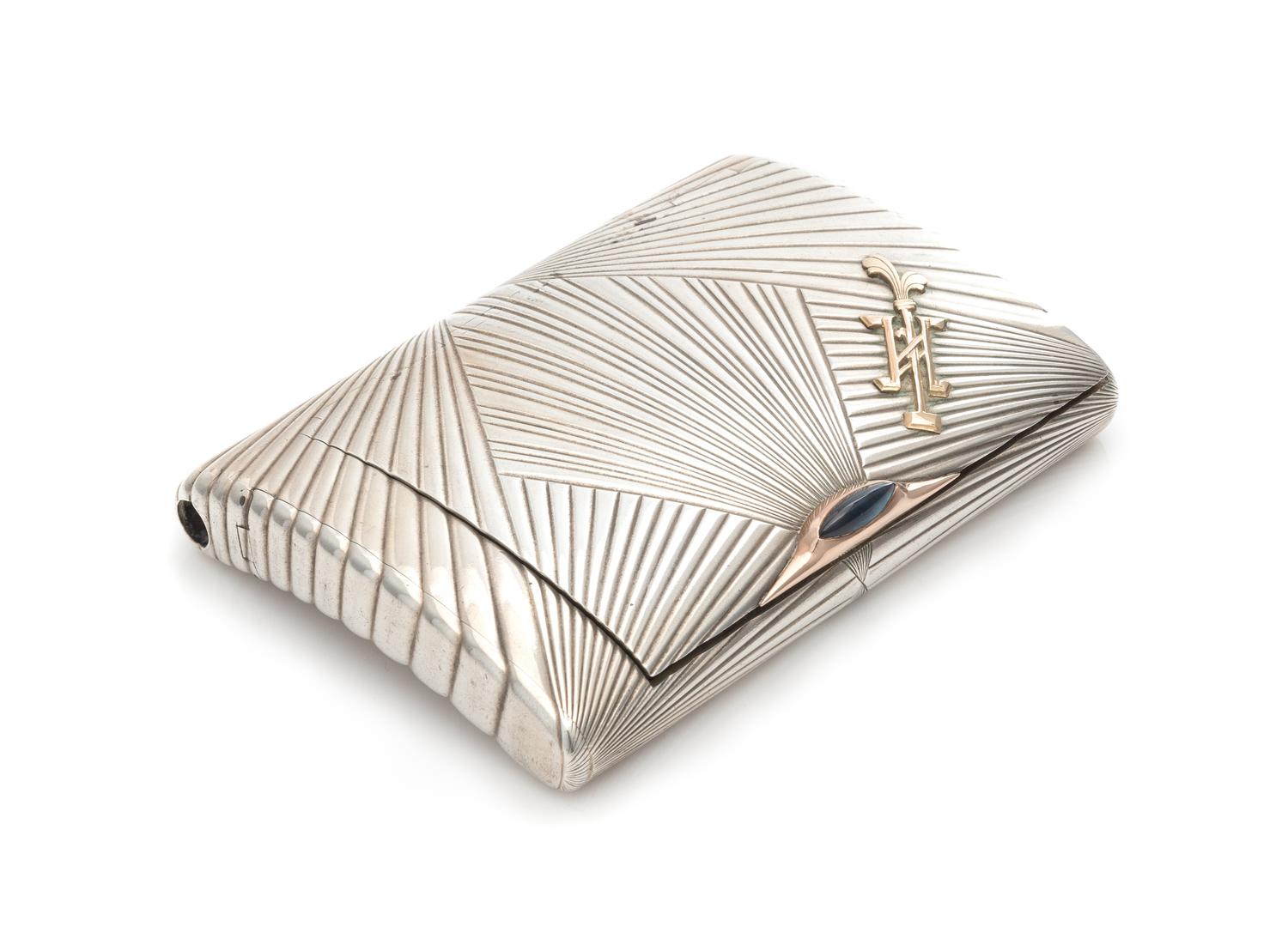 A Russian Silver Cigarette Case, Mark of Alexander Karpov, St. Petersburg, Late 19th/Early 20th Century, the geometric reeded case havi