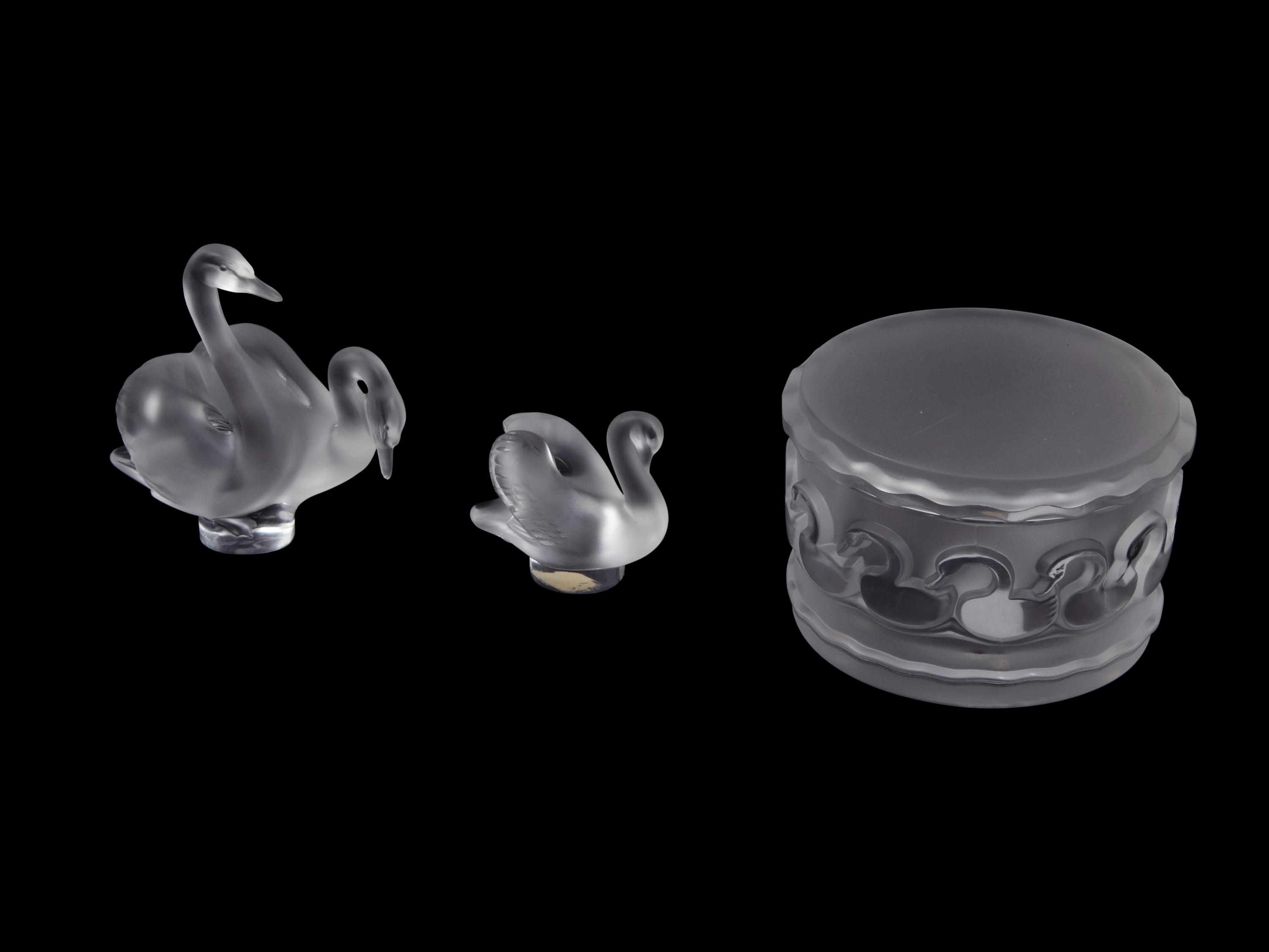 A Collection of Seven Lalique Glass Articles Height of tallest figure 5 1/2 inches.