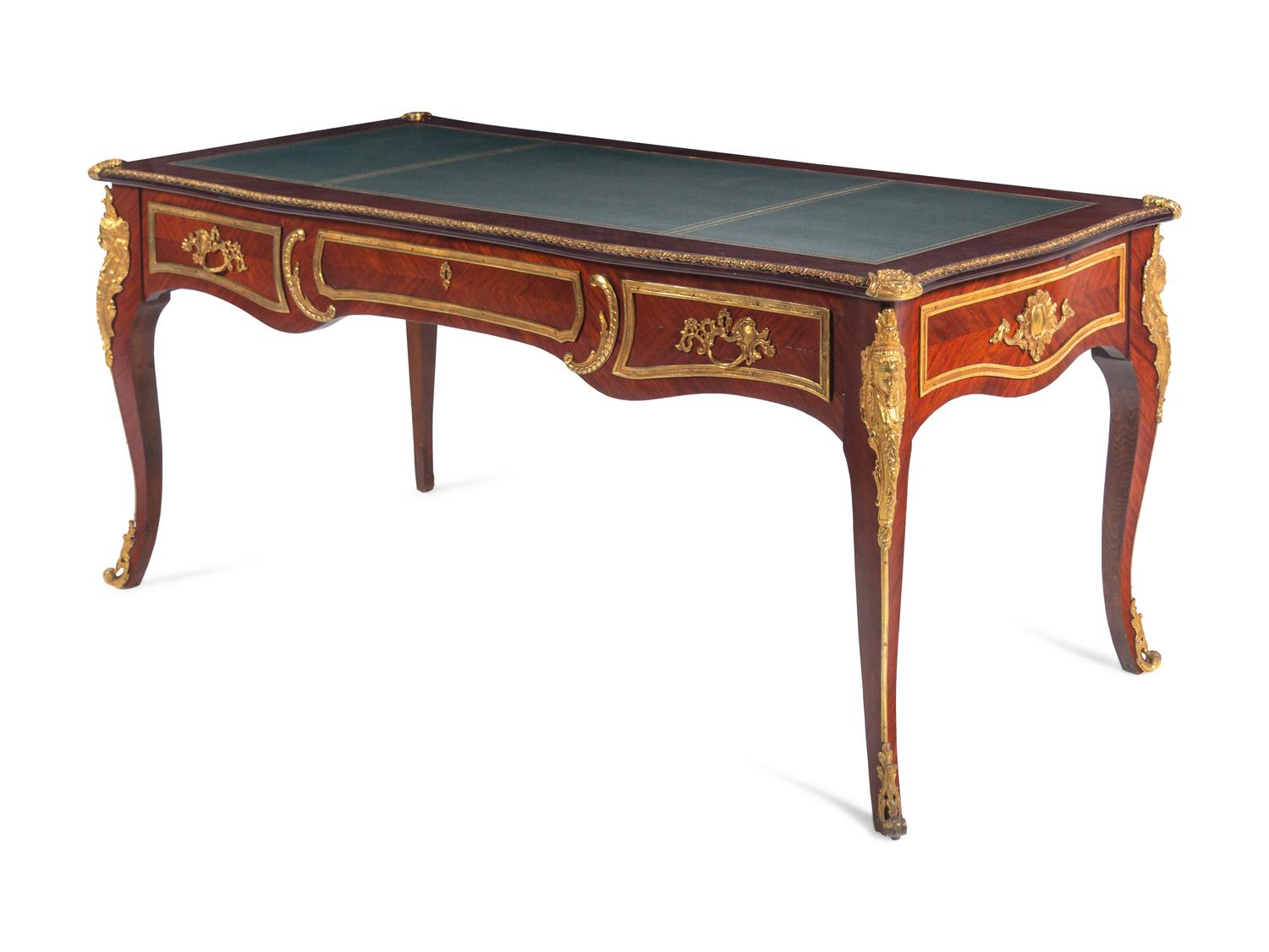 A Louis XV Style Gilt Bronze Mounted Mahogany Veneered Bureau Plat
