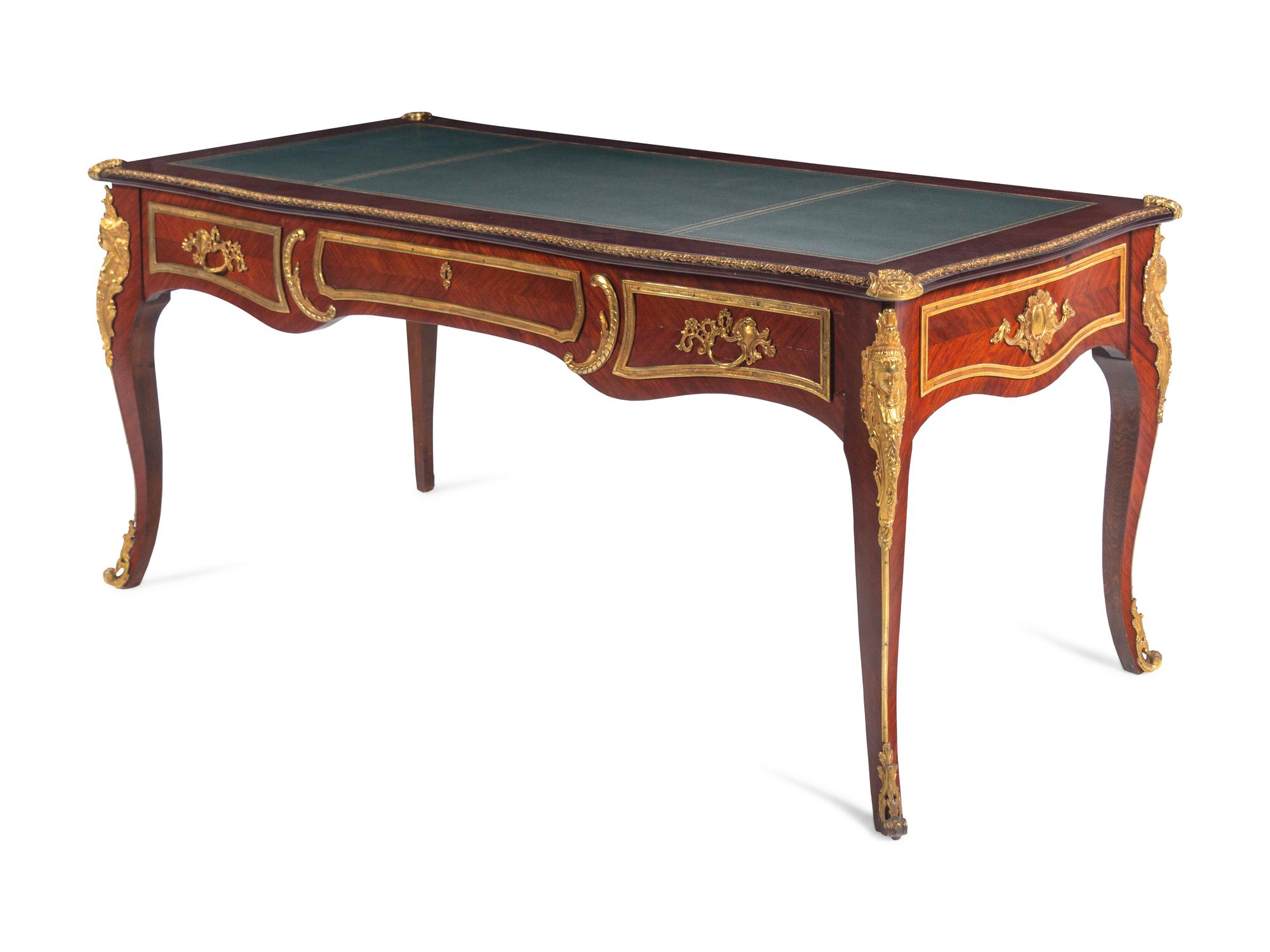 A Louis XV Style Gilt Bronze Mounted Mahogany Veneered Bureau Plat