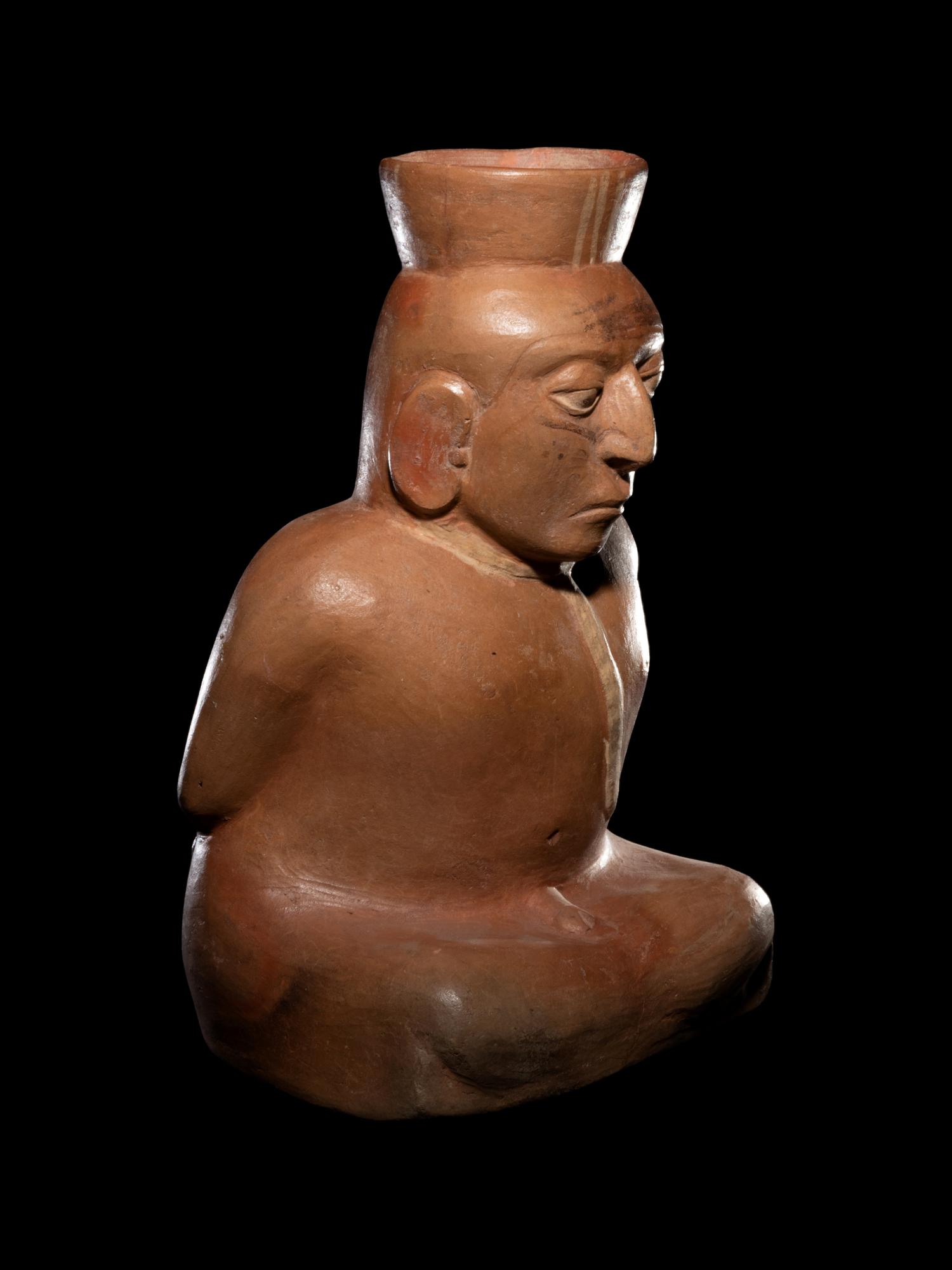 A Large Moche Terracotta Vessel Depicting a Bound Captive