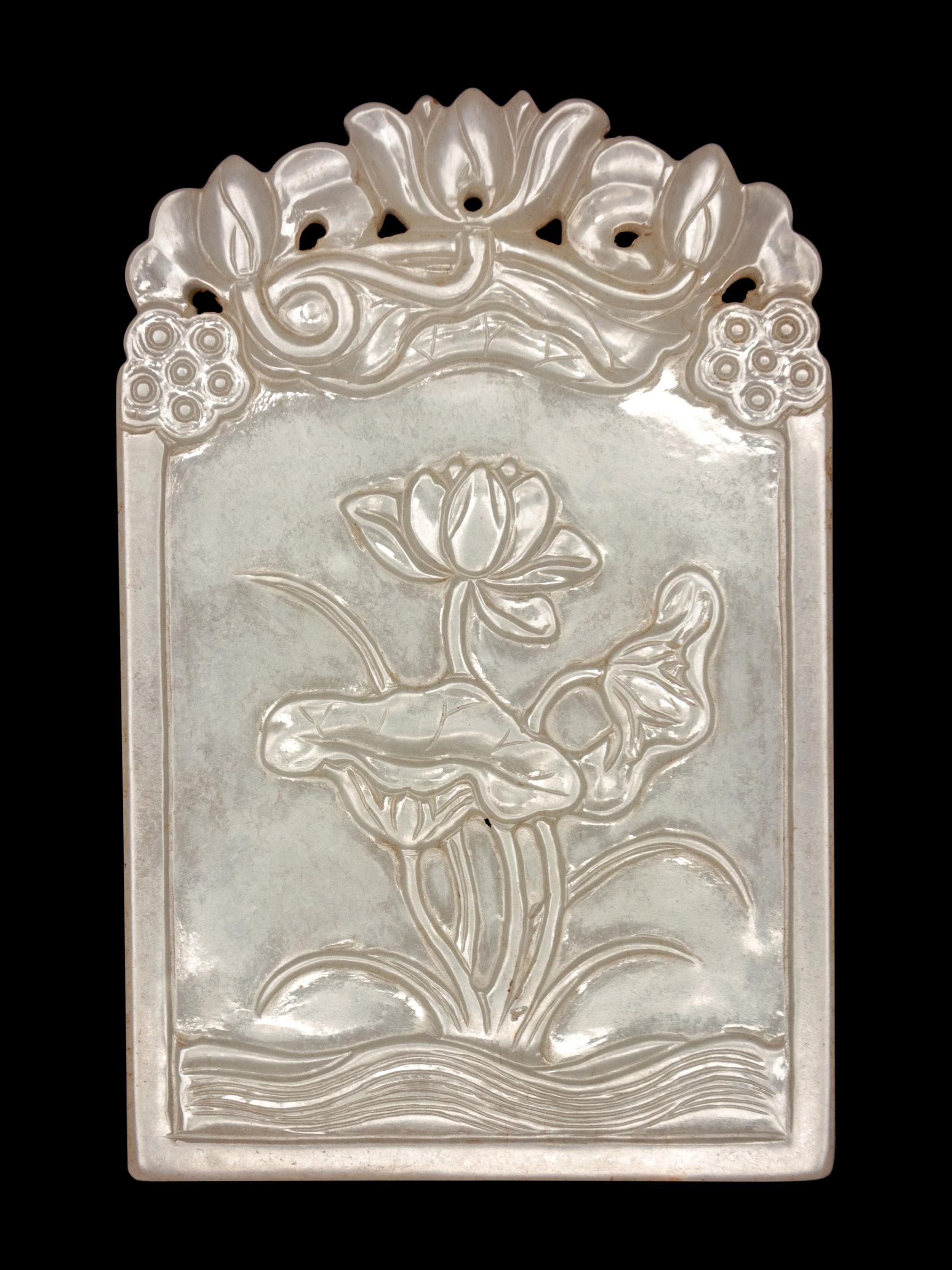 A Carved White Jade 'Lotus' Plaque