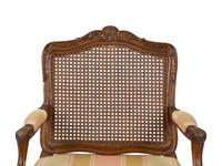 A Louis XV Style Carved Mahogany Cane Seat and Back Fauteuil — 20TH CENTURY