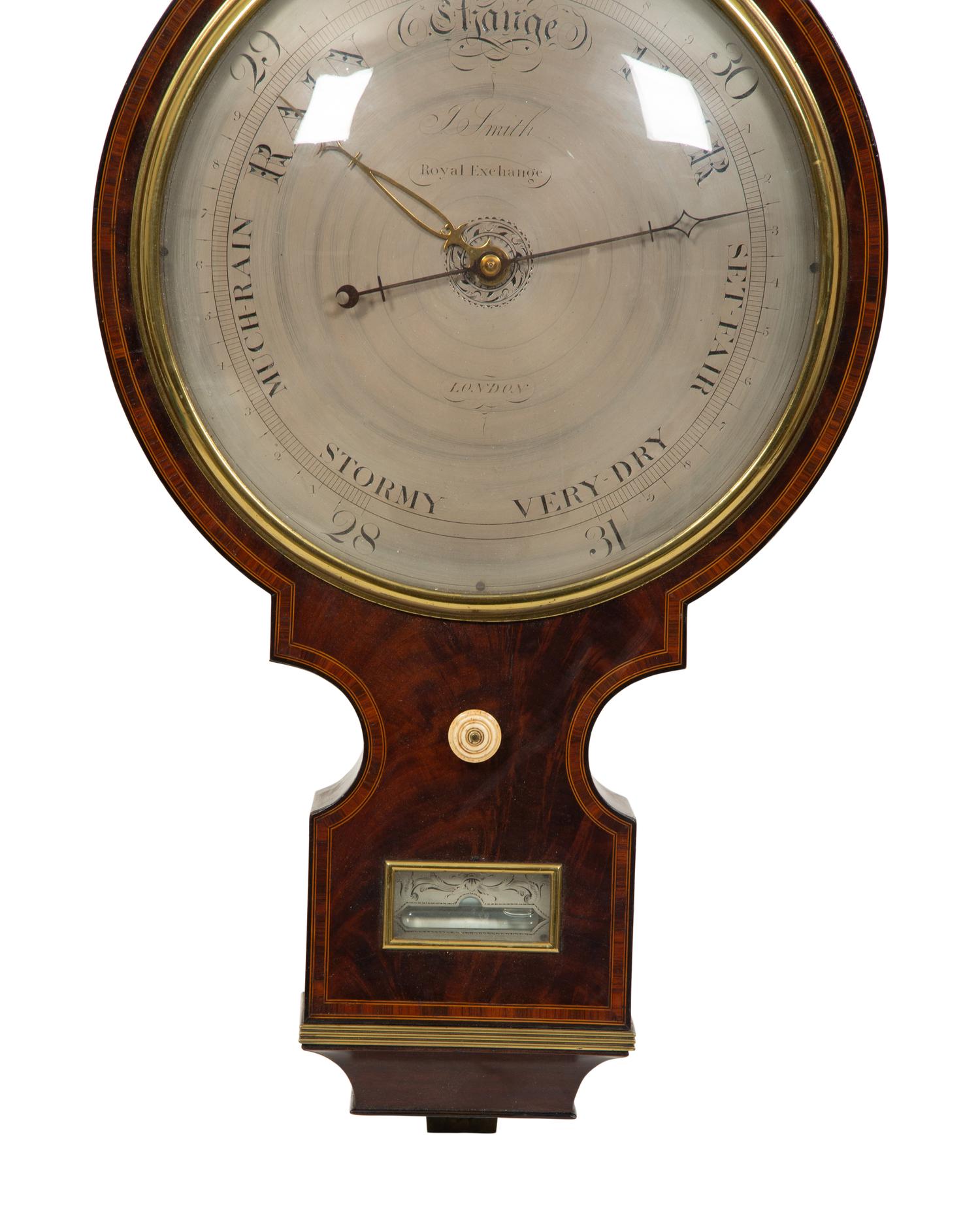 A Regency Crossbanded Mahogany Repeating Clock and Barometer