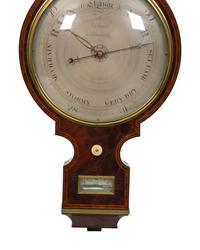 A Regency Crossbanded Mahogany Repeating Clock and Barometer