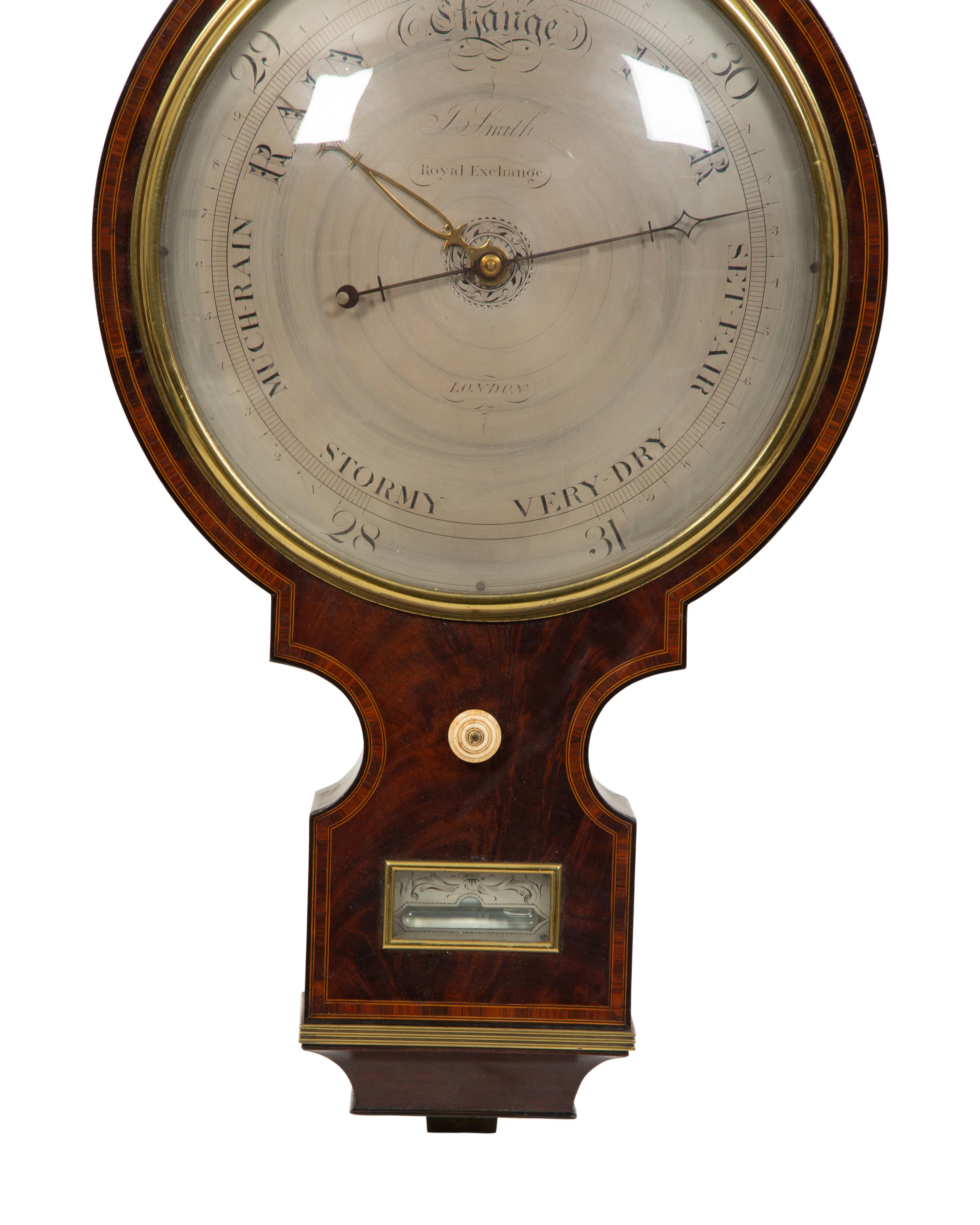A Regency Crossbanded Mahogany Repeating Clock and Barometer