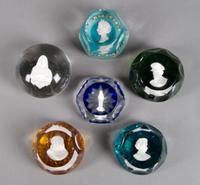 A Collection of Six Sulfide Paperweights, Diameter 3 1/4 inches.