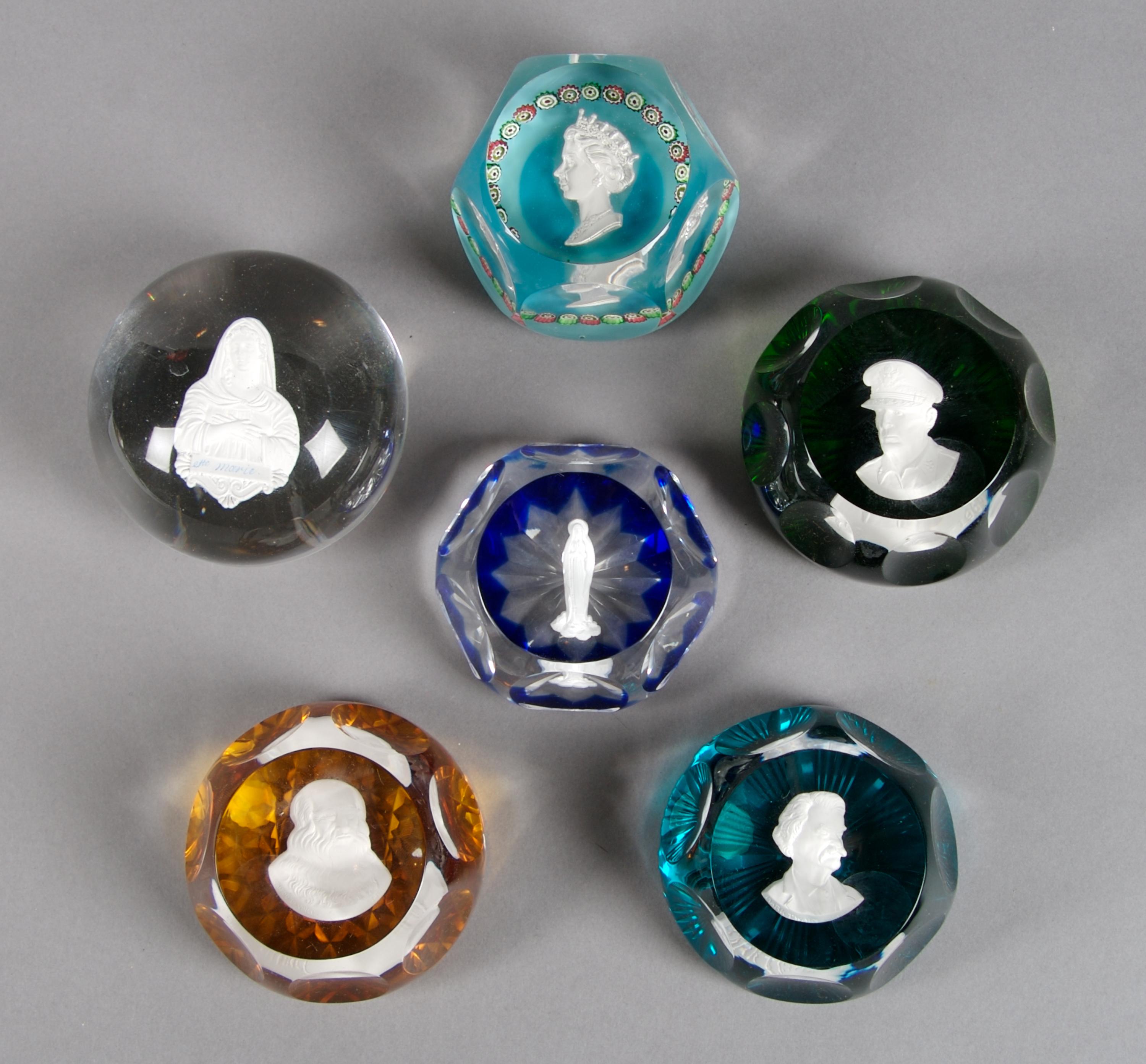 A Collection of Six Sulfide Paperweights, Diameter 3 1/4 inches.