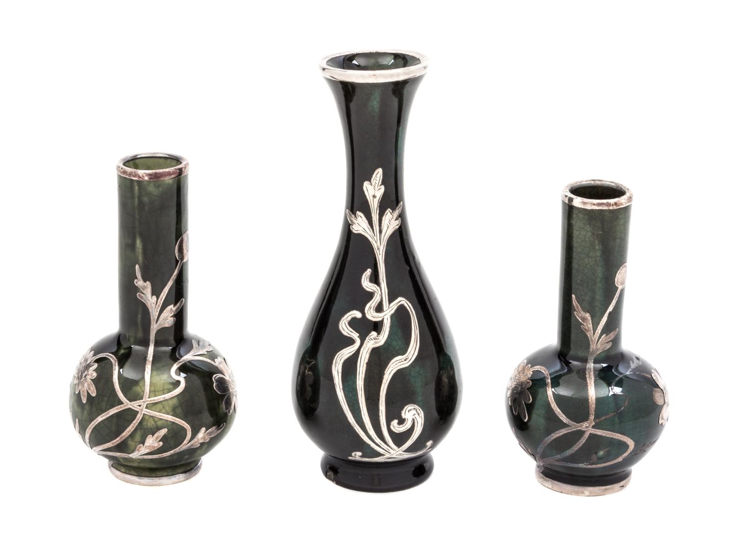 Three Ceramic Silver Overlay Cabinet Vases Height of tallest 5 inches.