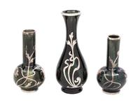 Three Ceramic Silver Overlay Cabinet Vases Height of tallest 5 inches.