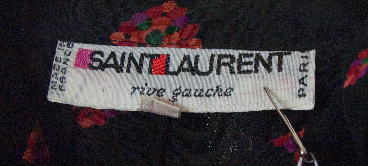 A Yves Saint Laurent Black Silk Patterned Blouse, Size 40.