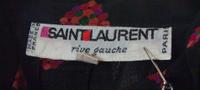 A Yves Saint Laurent Black Silk Patterned Blouse, Size 40.