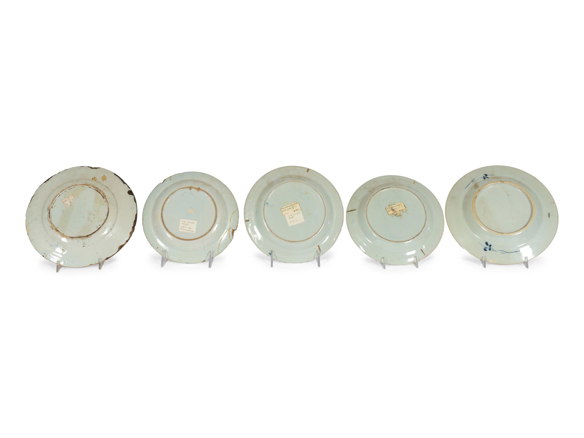 A Group of Thirteen Delft Earthenware Plates and Chargers