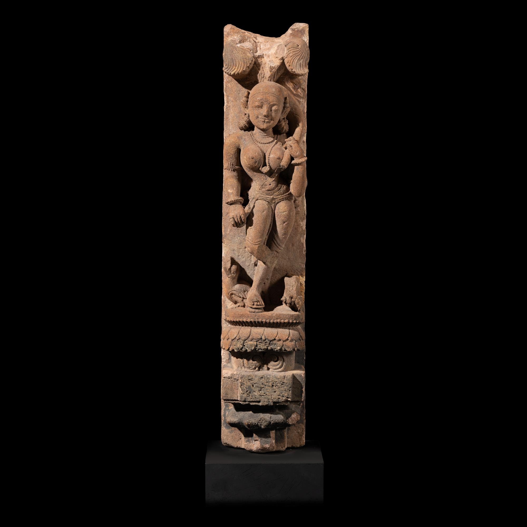 An Indian Sandstone Figure of an Apsara, Orissa, 11th Century
