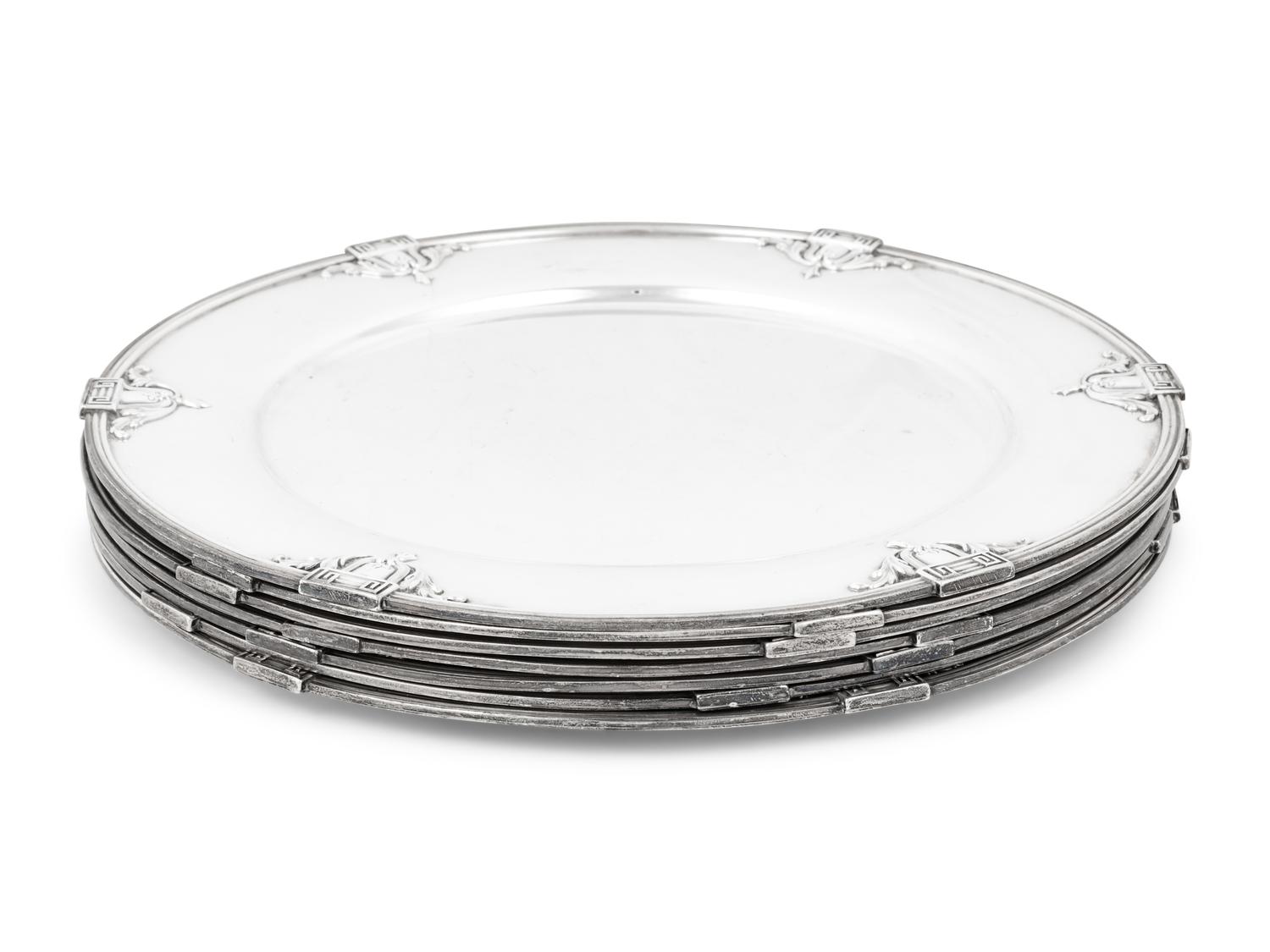 A Set of Eight American Silver Chargers