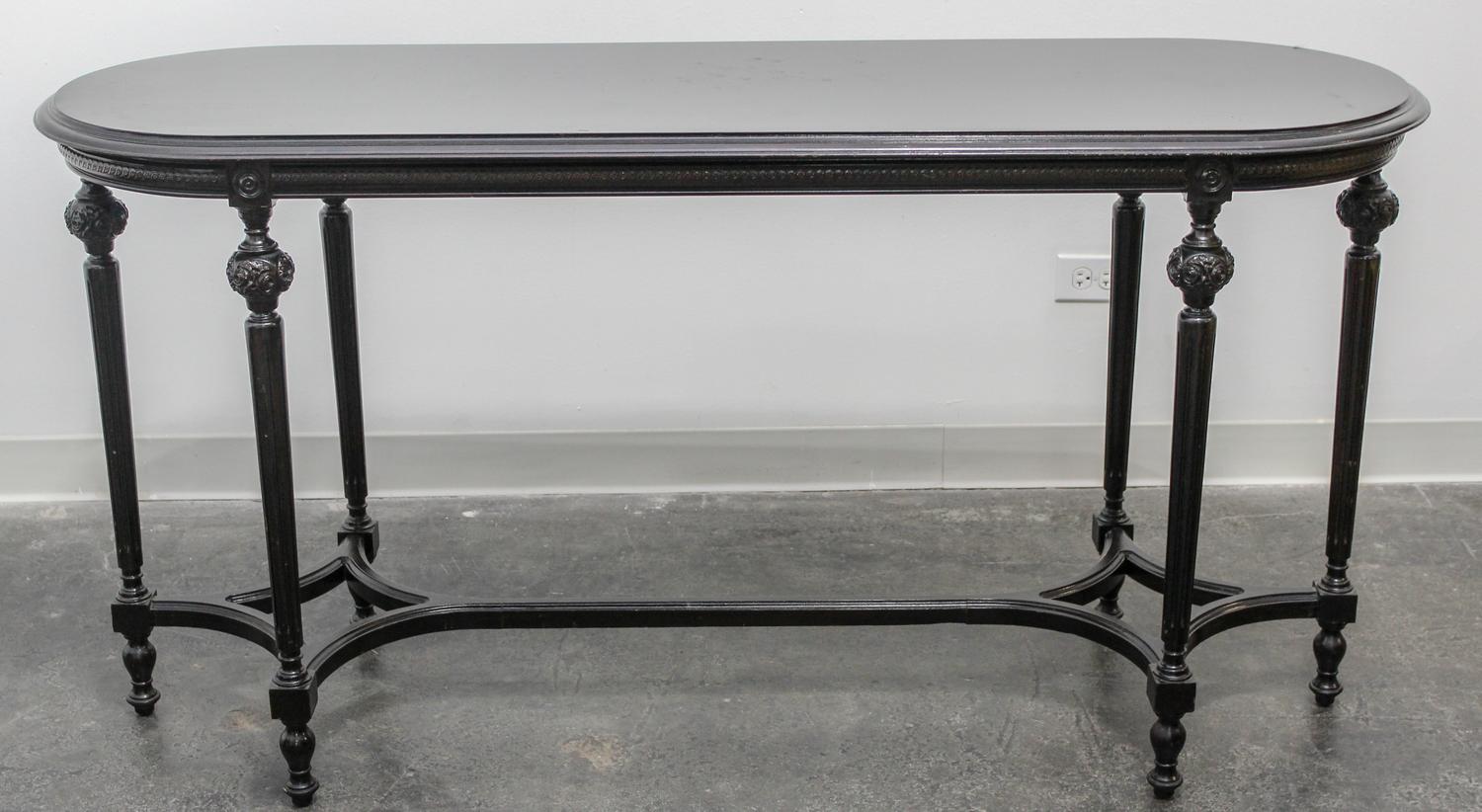 A Louis XVI Style Ebonized Table Height 30 1/2 x width 59 x depth 20 inches. — 20TH CENTURY