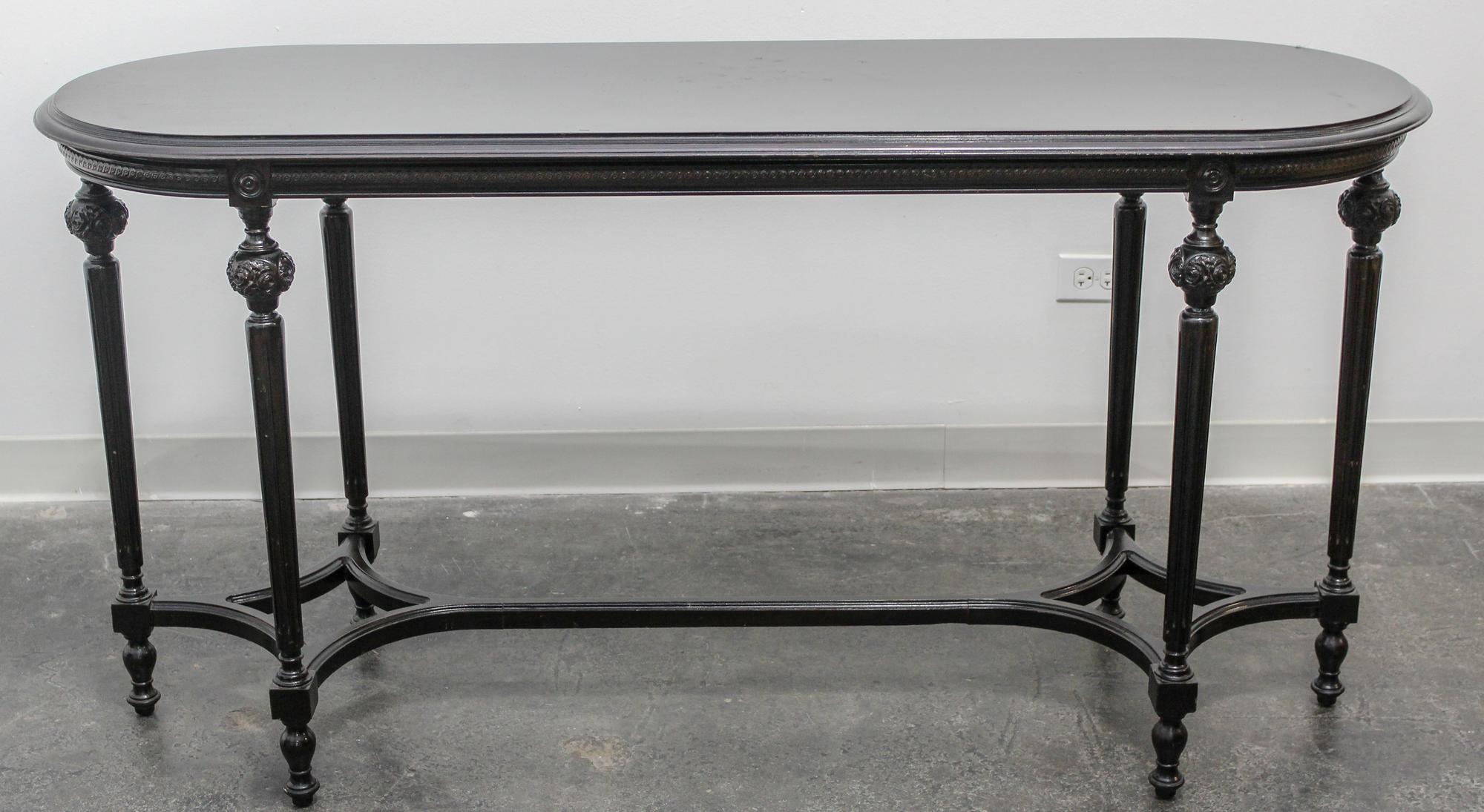 A Louis XVI Style Ebonized Table Height 30 1/2 x width 59 x depth 20 inches. — 20TH CENTURY