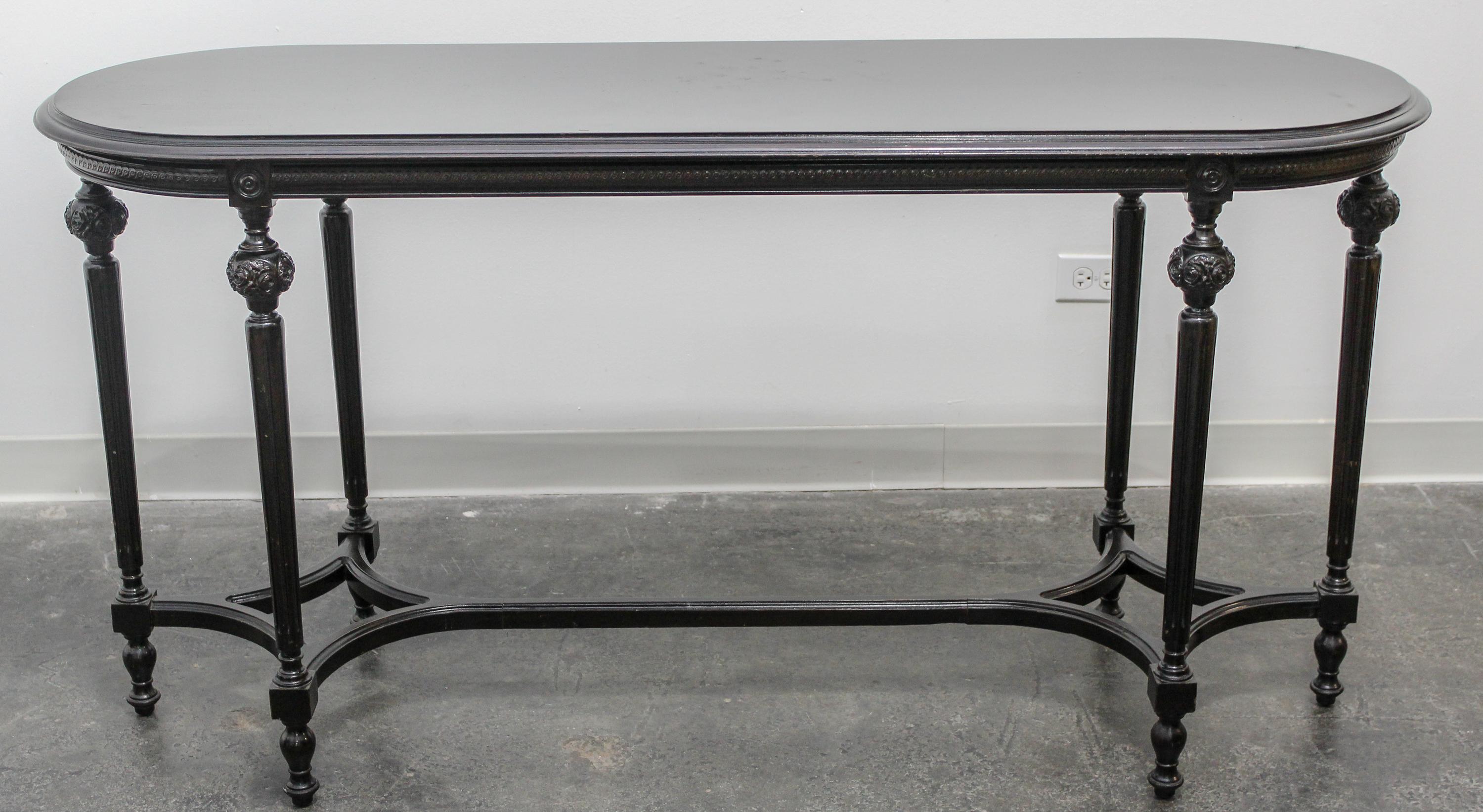 A Louis XVI Style Ebonized Table Height 30 1/2 x width 59 x depth 20 inches. — 20TH CENTURY