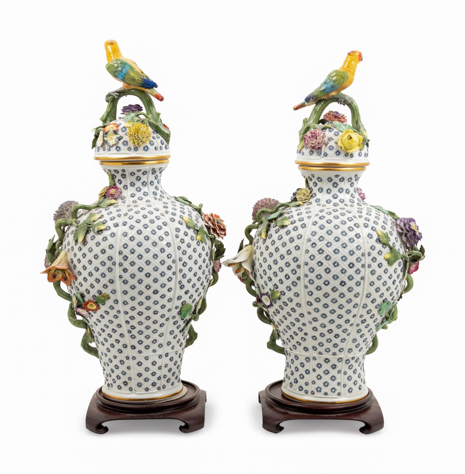 A Pair of Continental Porcelain Covered Urns