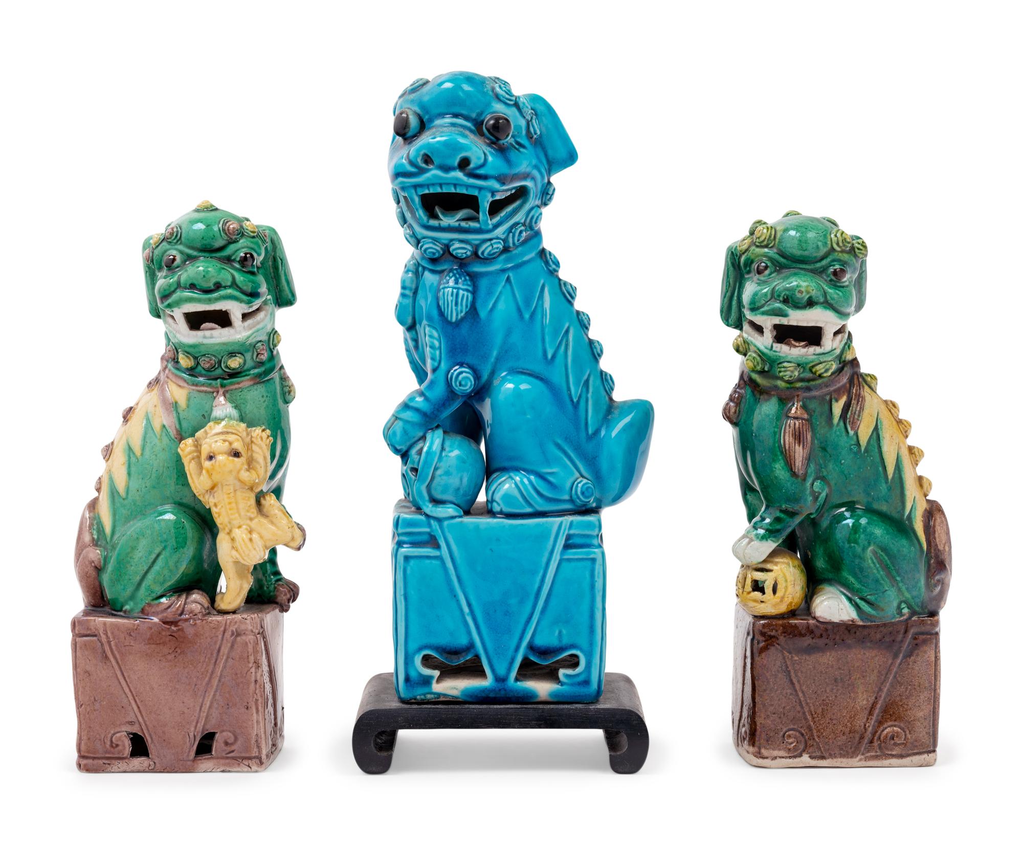 Three Chinese Porcelain Figures of Fu Lions