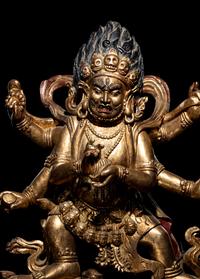 A Large Sino-Tibetan Gilt and Red Lacquered Wood Figure of a Mahākāla
