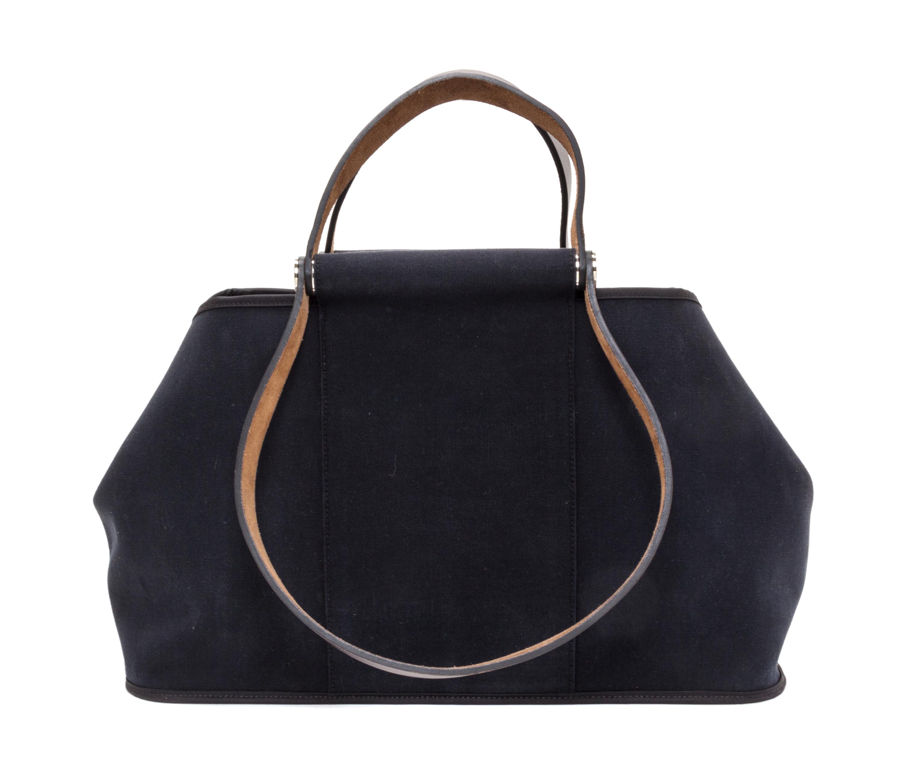 An Hermes Black Canvas Cabag Elan Tote, 10" x 14" x 5.5".