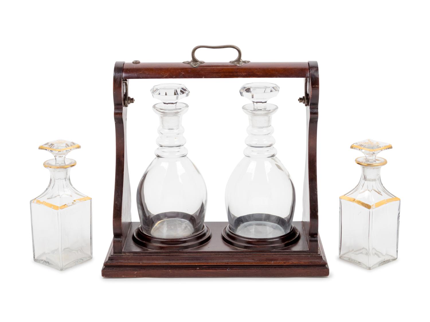 An Edwardian Mahogany Two-Bottle Tantalus