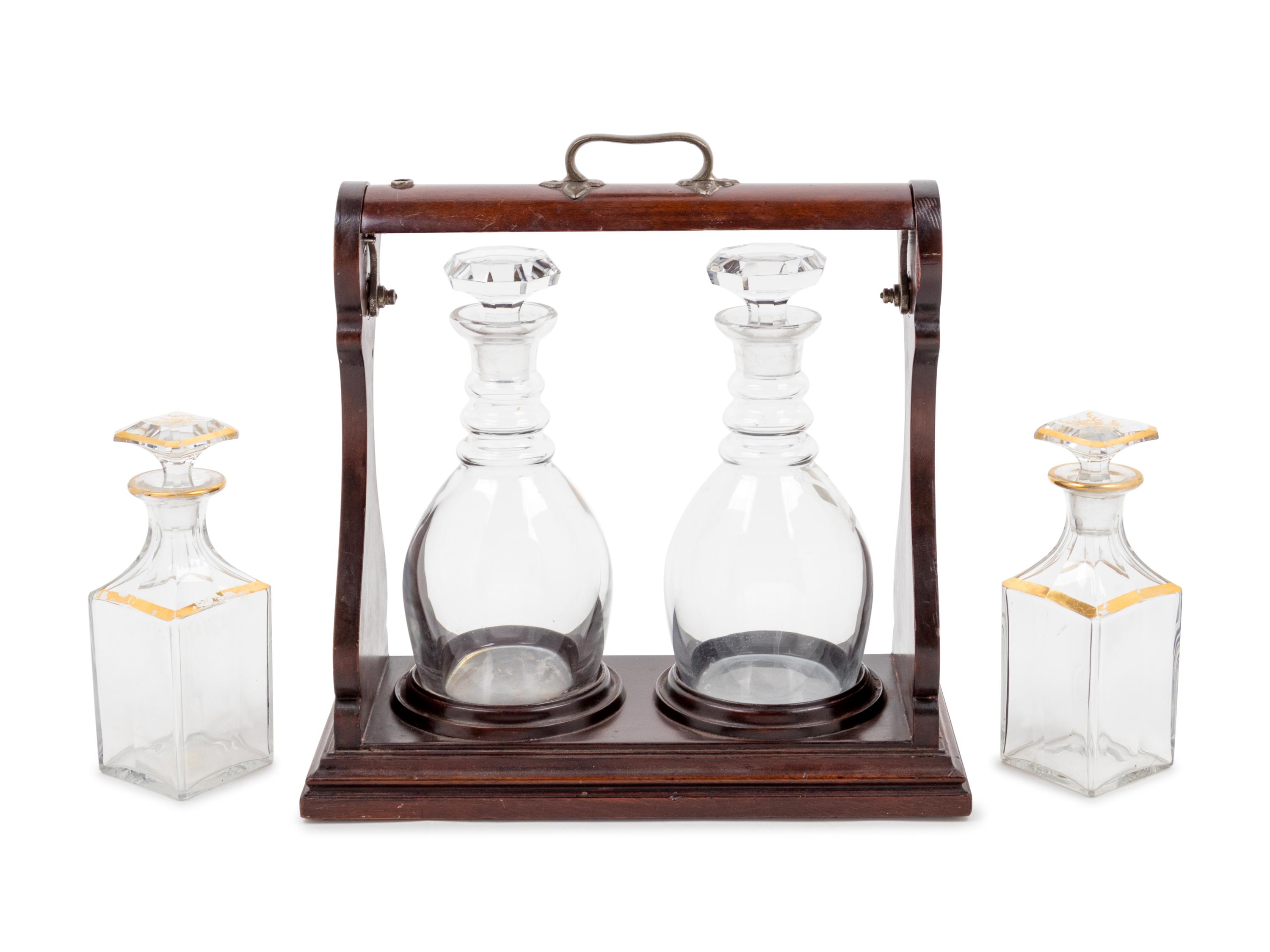 An Edwardian Mahogany Two-Bottle Tantalus