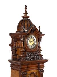 A Symphonion Style 38B Eroica Upright Three Disc Music Box with Clock