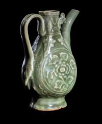 A Chinese Carved Longquan Celadon Glazed Porcelain Ewer