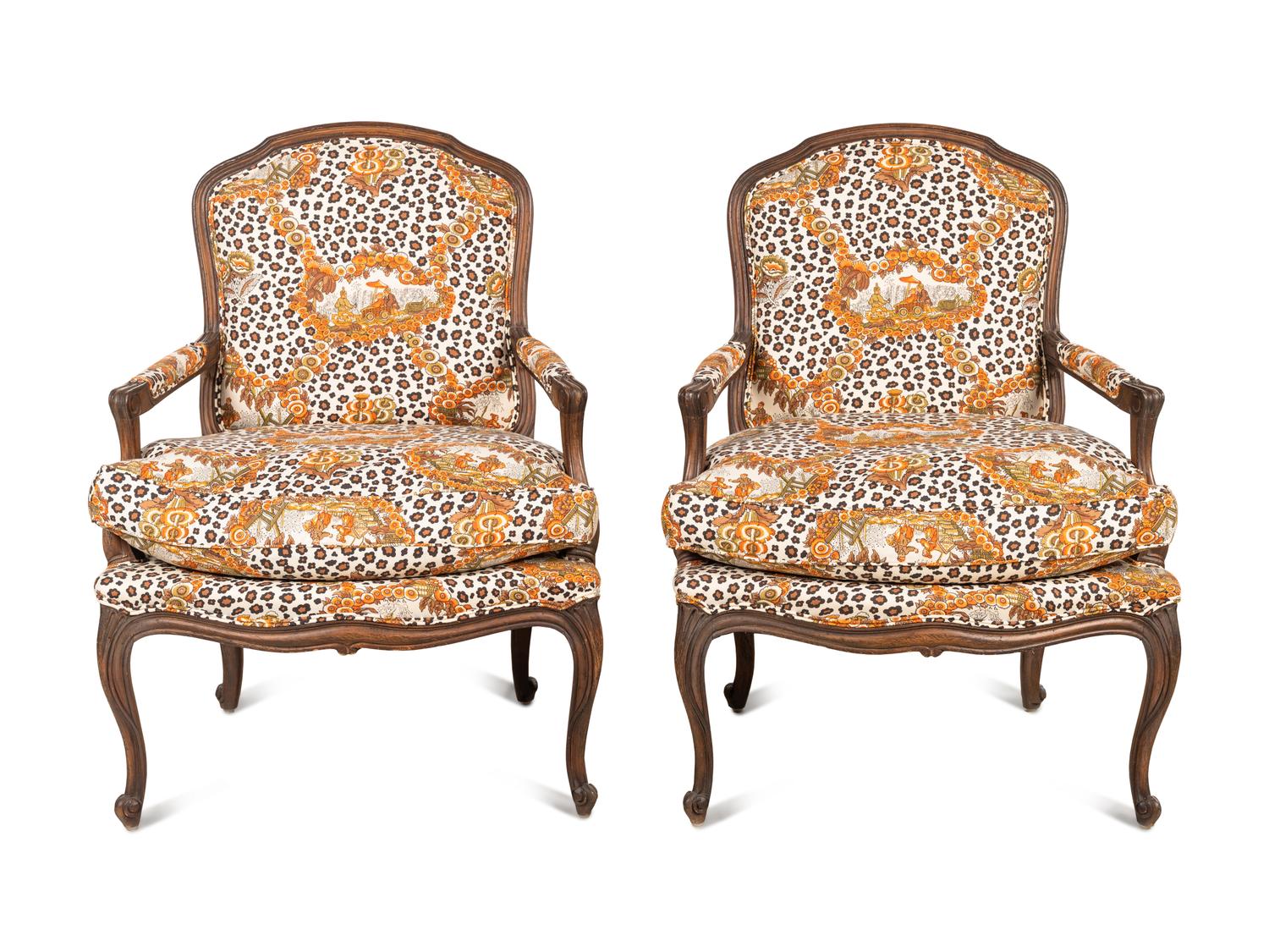 A Pair of Louis XV Style Oak Fauteuils